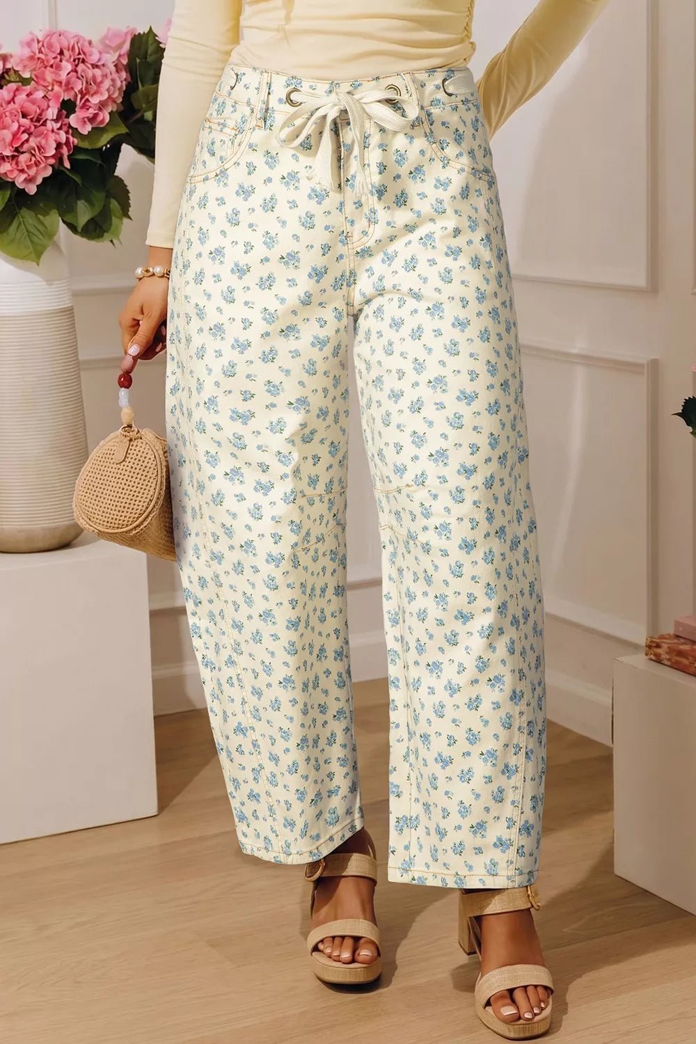 Grommet Knot Waist Floral Barrel Leg Jeans designed for comfort and style at Lookzlike