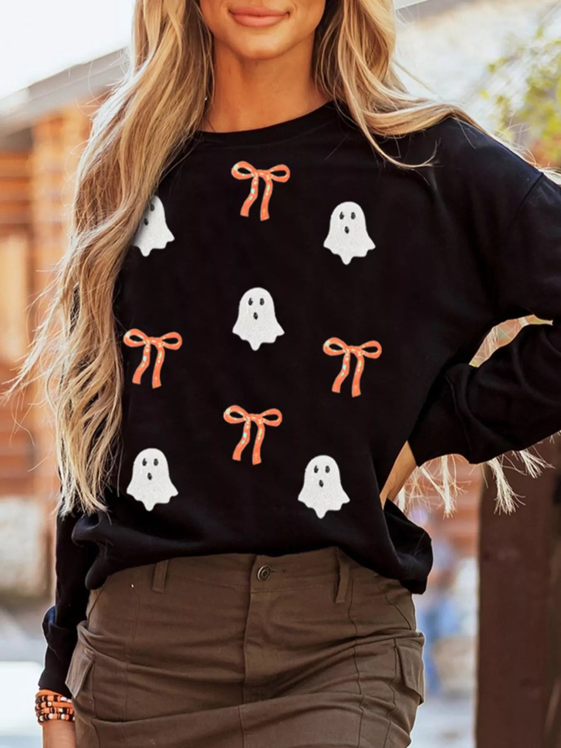 Halloween Ghost Bow Sequin Patched Drop Shoulder Sweatshirt designed for comfort and style at Lookzlike