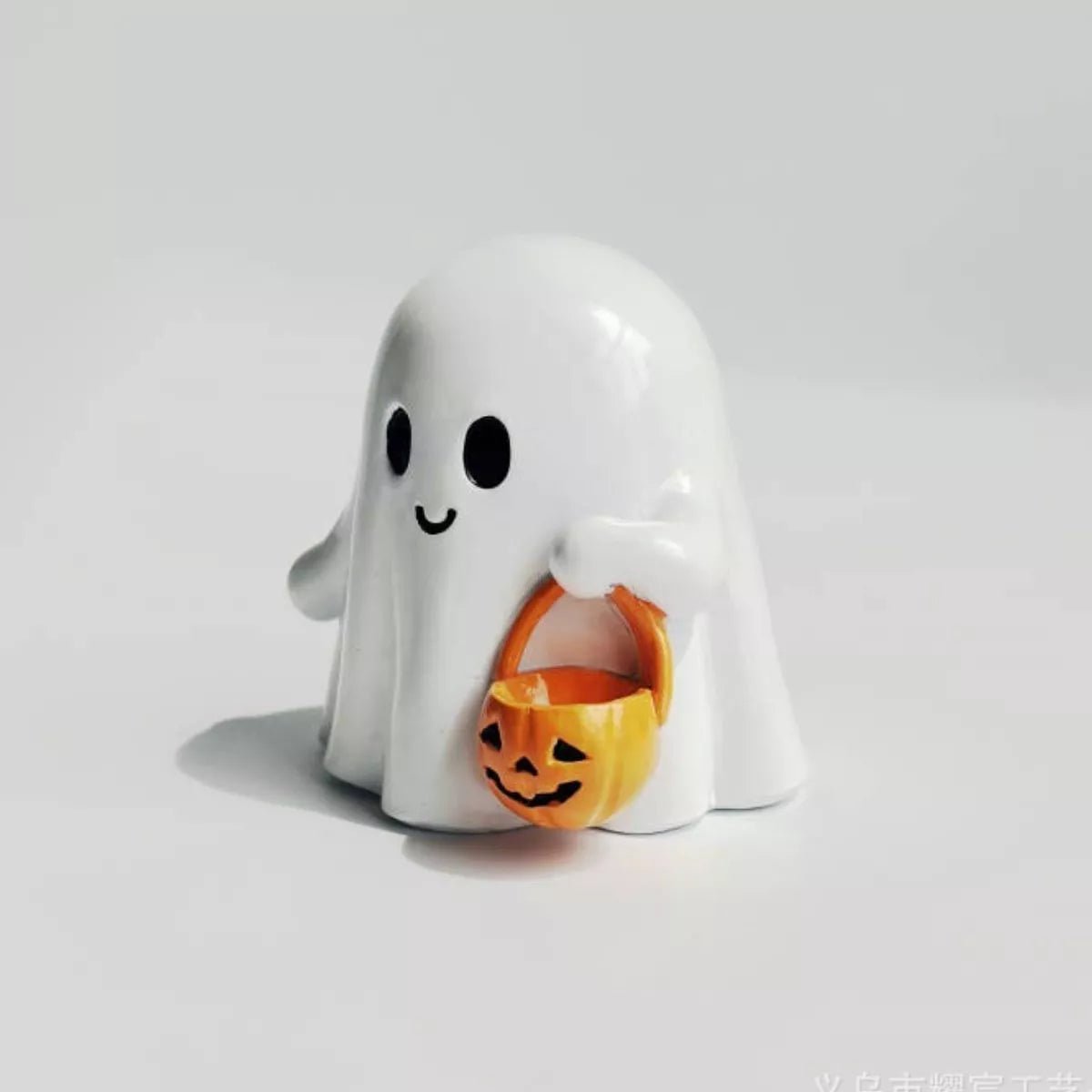 Halloween Ghost Ornament with Pumpkin Basket designed for comfort and style at Lookzlike