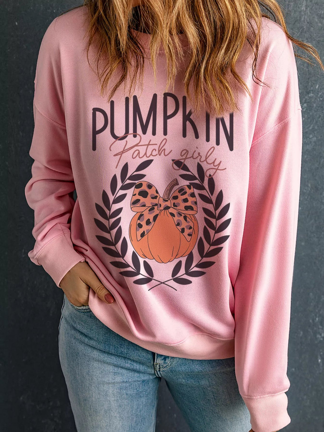 Halloween Leopard Bowknot Pumpkin Graphic Sweatshirt designed for comfort and style at Lookzlike
