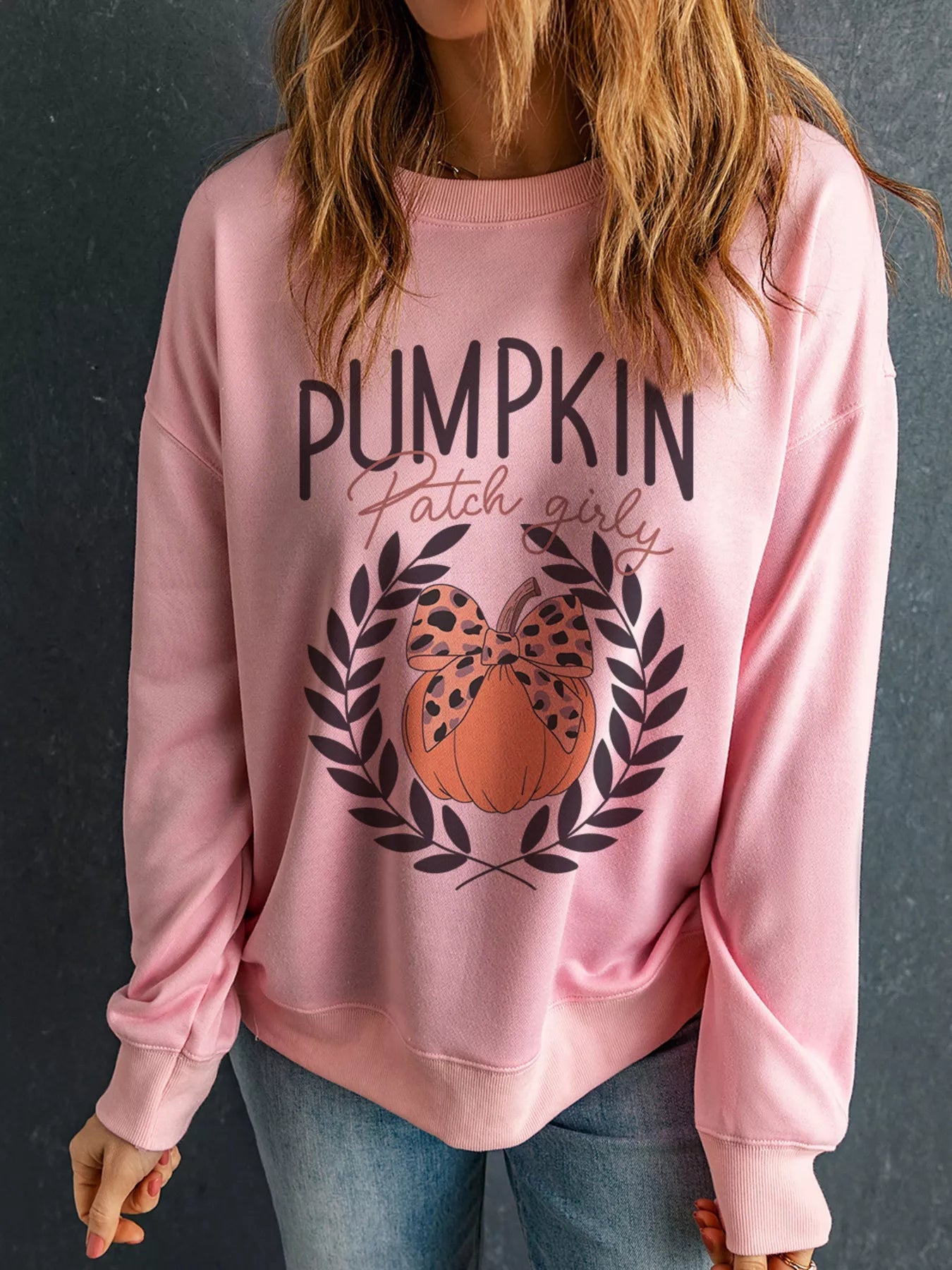 Halloween Leopard Bowknot Pumpkin Graphic Sweatshirt designed for comfort and style at Lookzlike