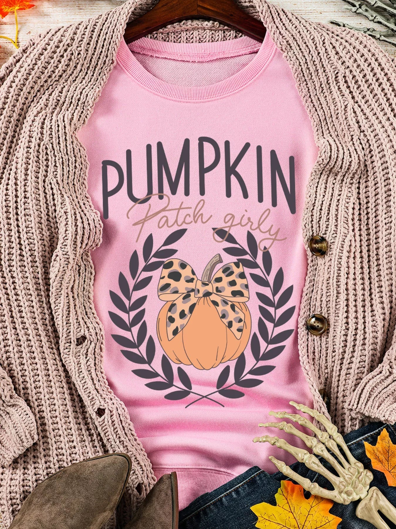 Halloween Leopard Bowknot Pumpkin Graphic Sweatshirt designed for comfort and style at Lookzlike