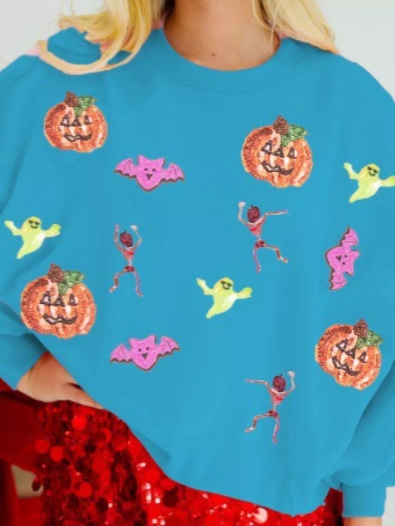 Halloween Sequin Round Neck Long Sleeve Sweatshirt designed for comfort and style at Lookzlike