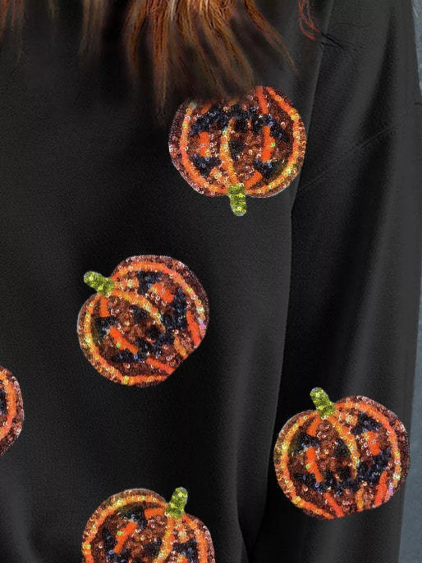 Halloween Sequin Round Neck Long Sleeve Sweatshirt designed for comfort and style at Lookzlike