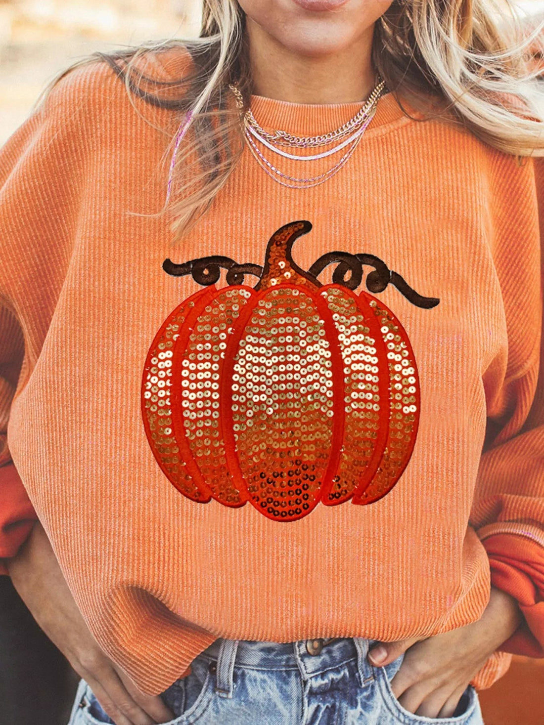 Halloween Sequined Pumpkin Ribbed Round Neck Sweatshirt designed for comfort and style at Lookzlike
