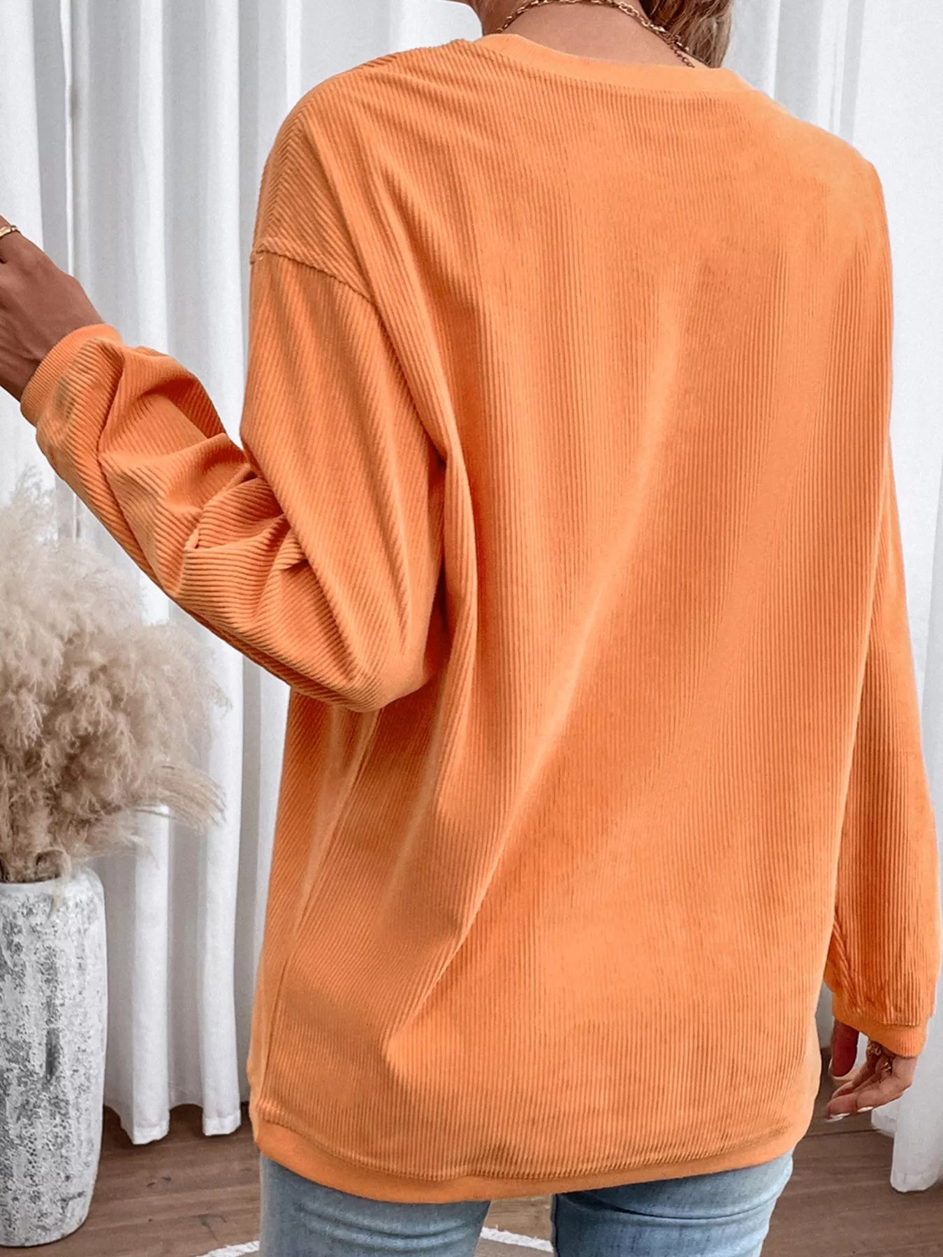 Halloween Sequined Pumpkin Ribbed Round Neck Sweatshirt designed for comfort and style at Lookzlike