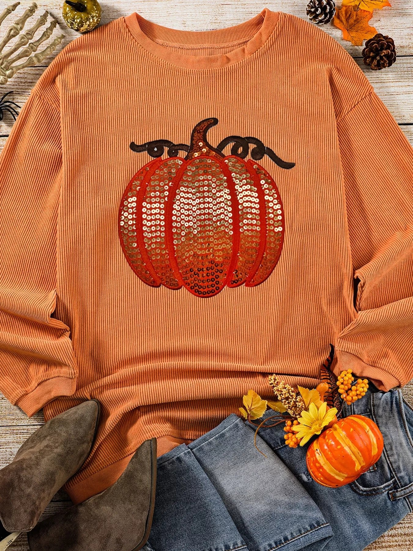 Halloween Sequined Pumpkin Ribbed Round Neck Sweatshirt designed for comfort and style at Lookzlike