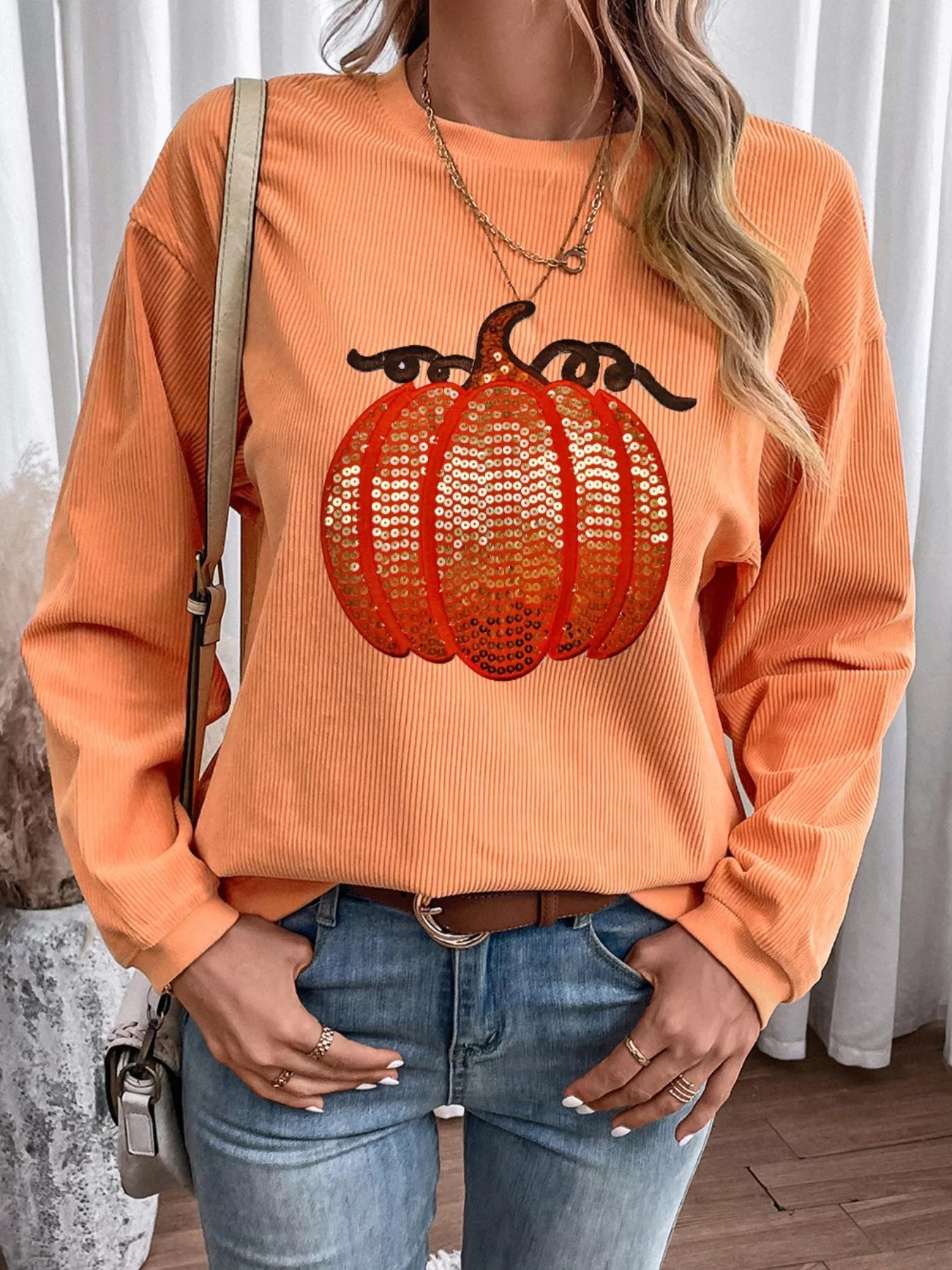 Halloween Sequined Pumpkin Ribbed Round Neck Sweatshirt designed for comfort and style at Lookzlike