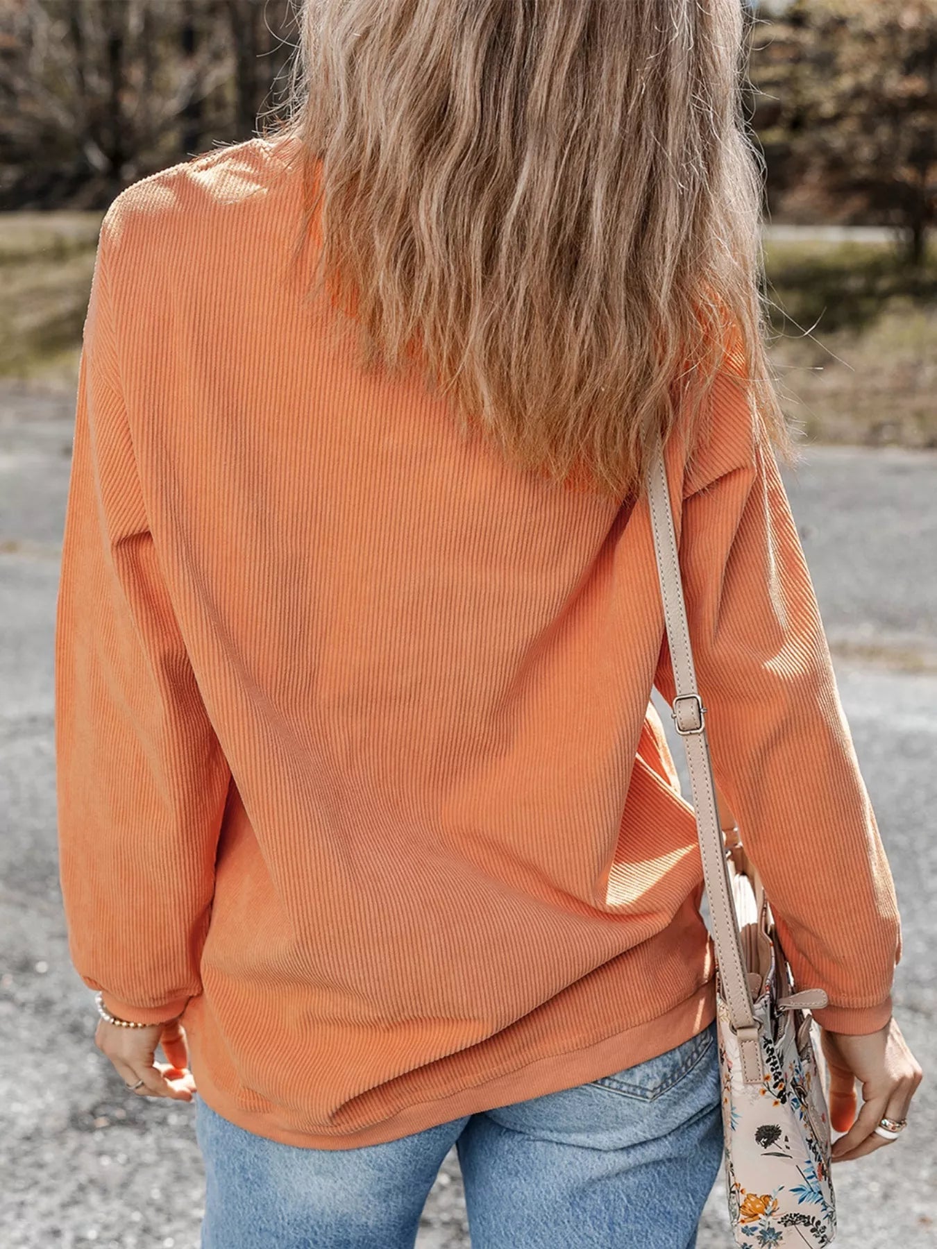 Halloween Sequined Pumpkin Ribbed Round Neck Sweatshirt designed for comfort and style at Lookzlike