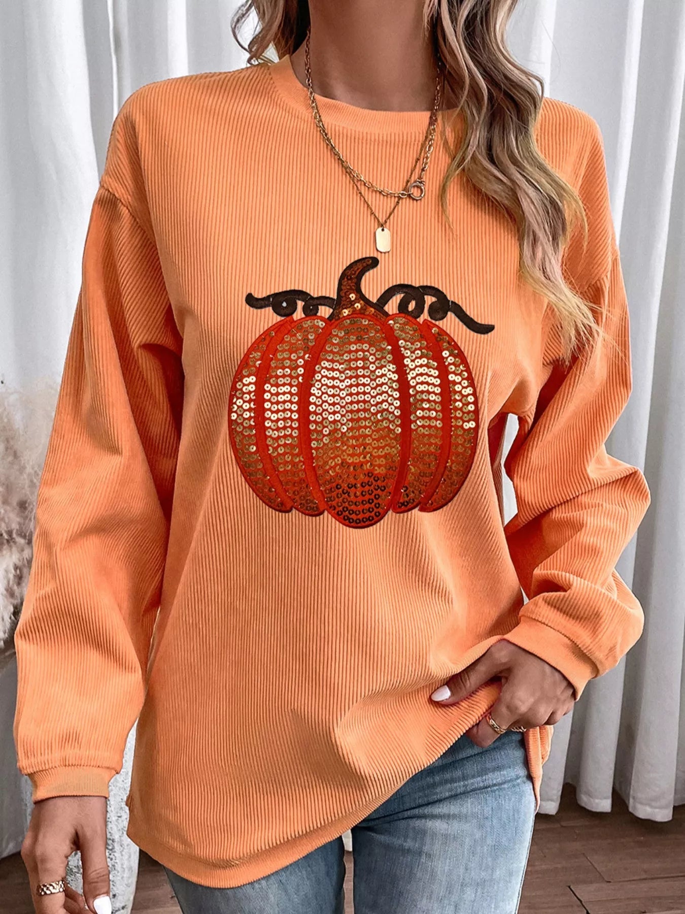 Halloween Sequined Pumpkin Ribbed Round Neck Sweatshirt designed for comfort and style at Lookzlike