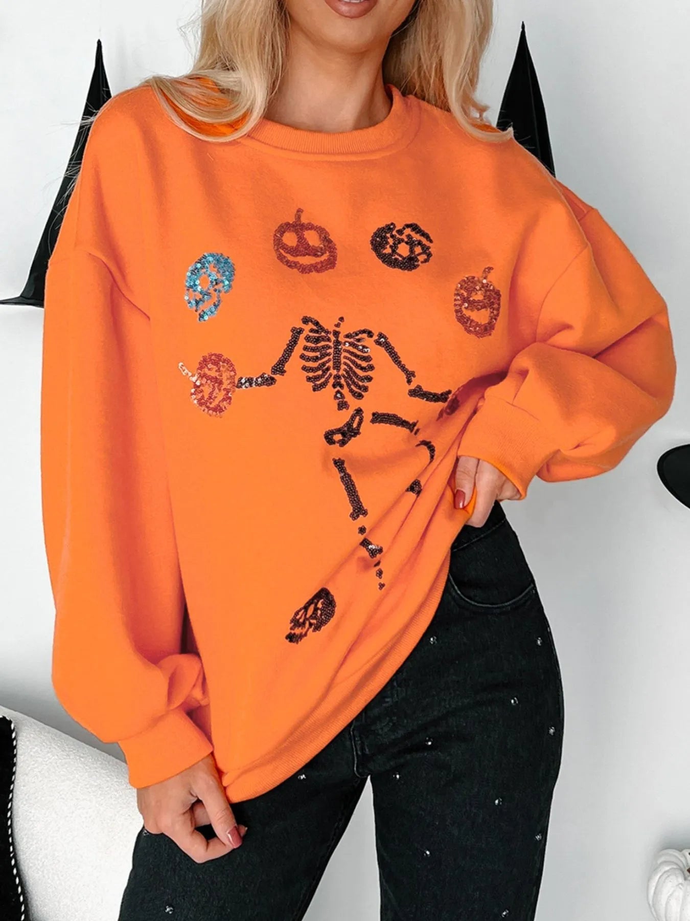 Halloween Skeleton Pumpkin Sweatshirt designed for comfort and style at Lookzlike