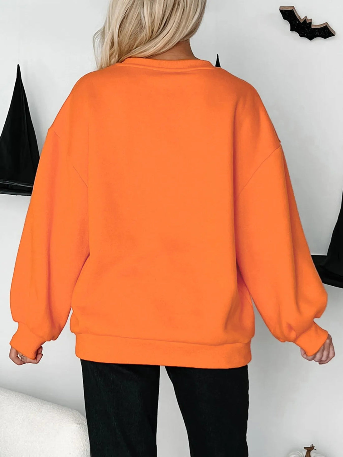 Halloween Skeleton Pumpkin Sweatshirt designed for comfort and style at Lookzlike