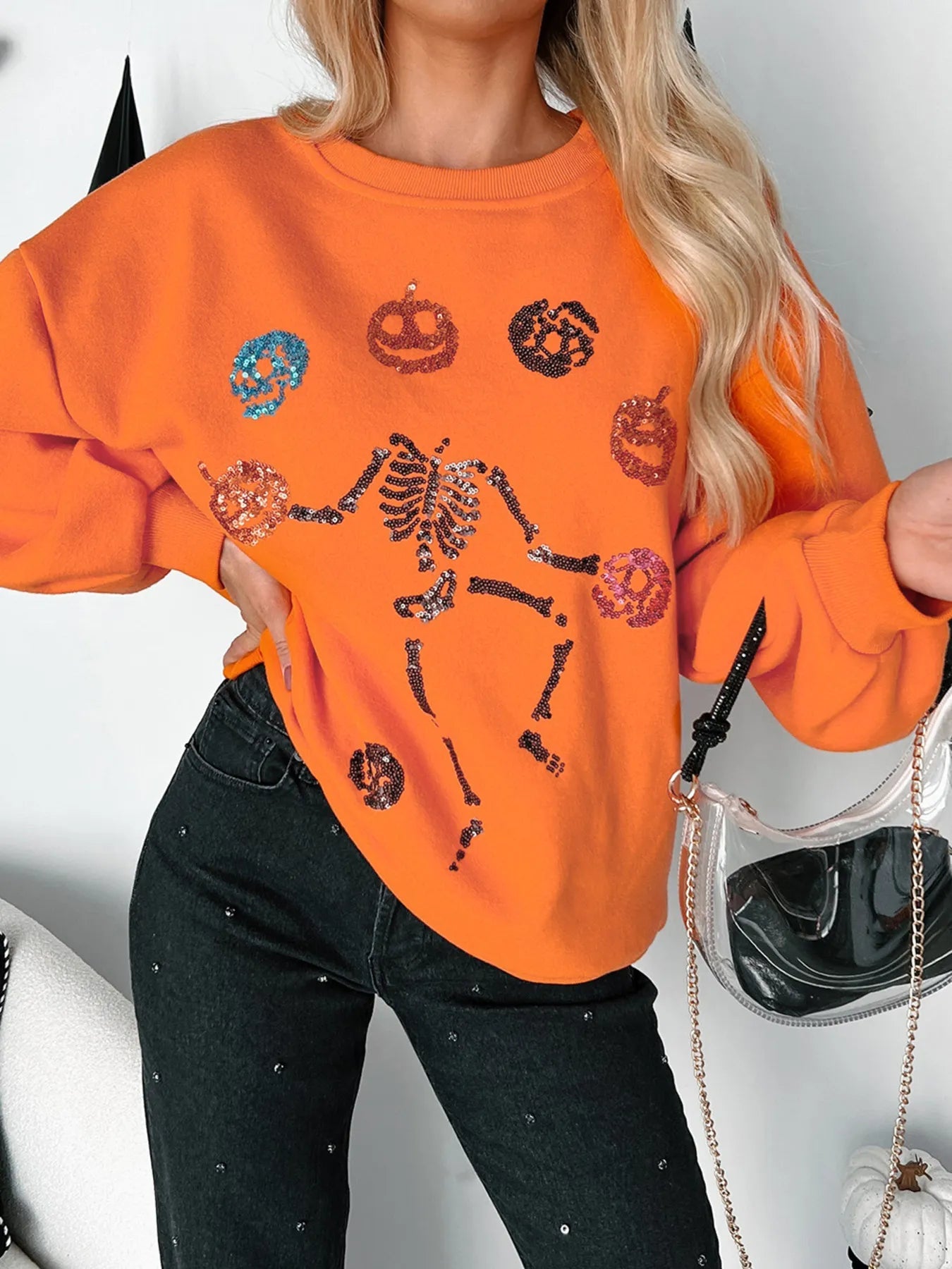 Halloween Skeleton Pumpkin Sweatshirt designed for comfort and style at Lookzlike
