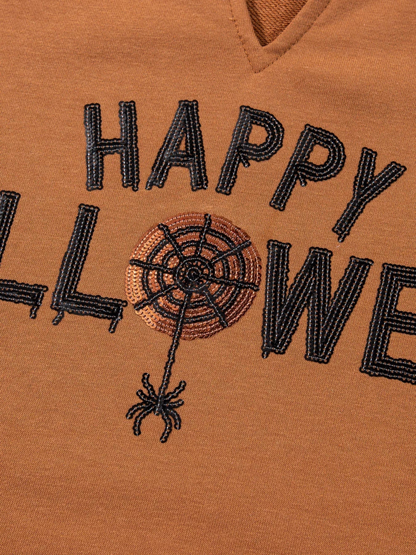 Happy Halloween Graphic Notched Long Sleeve Loose Top designed for comfort and style at Lookzlike