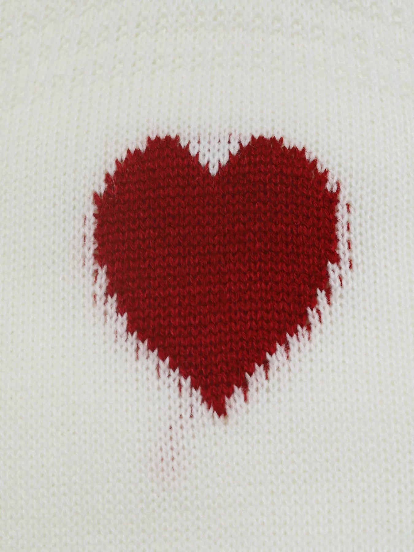 Heart Pattern Dropped Shoulder Sweater designed for comfort and style at Lookzlike