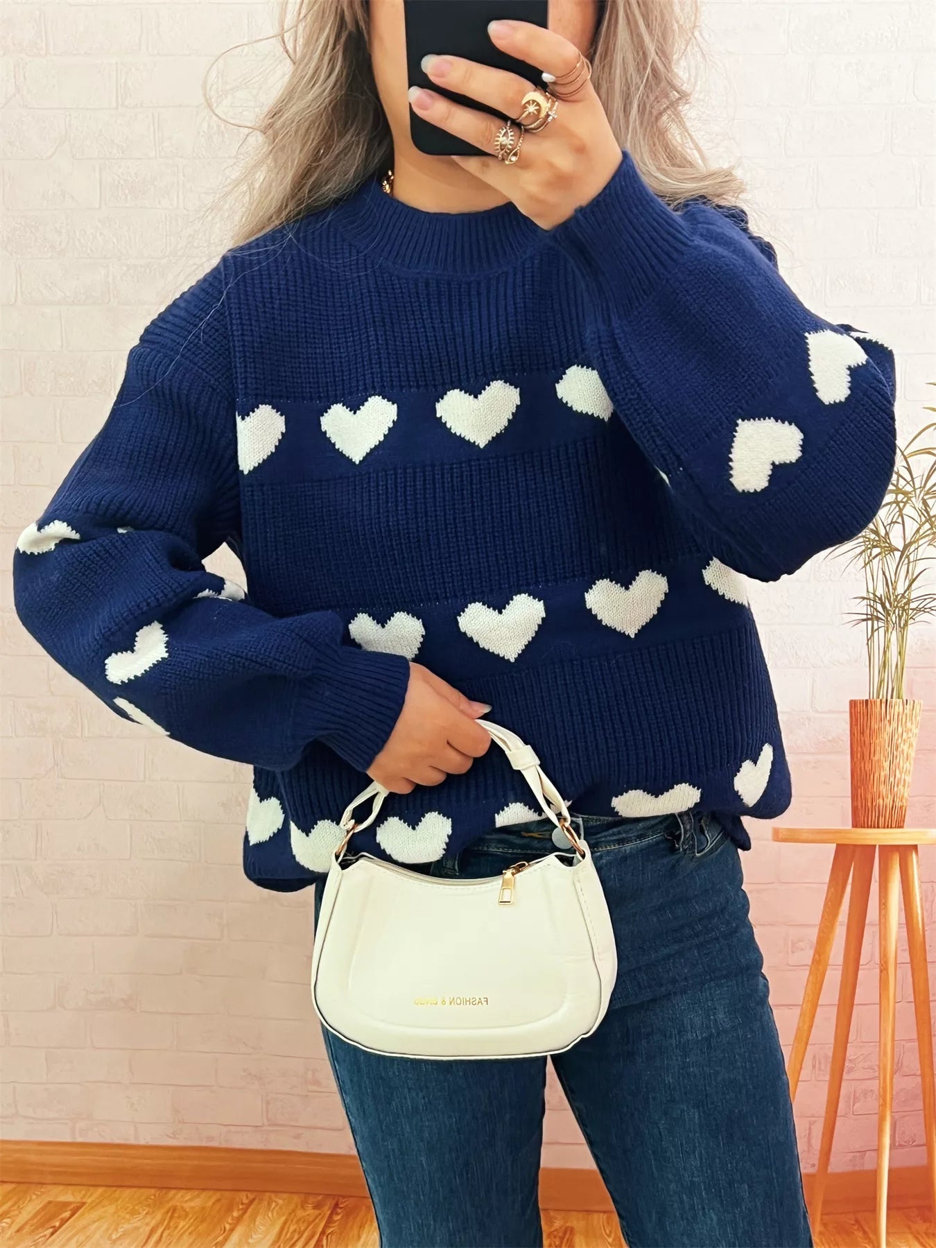 Heart Pattern Dropped Shoulder Sweater designed for comfort and style at Lookzlike