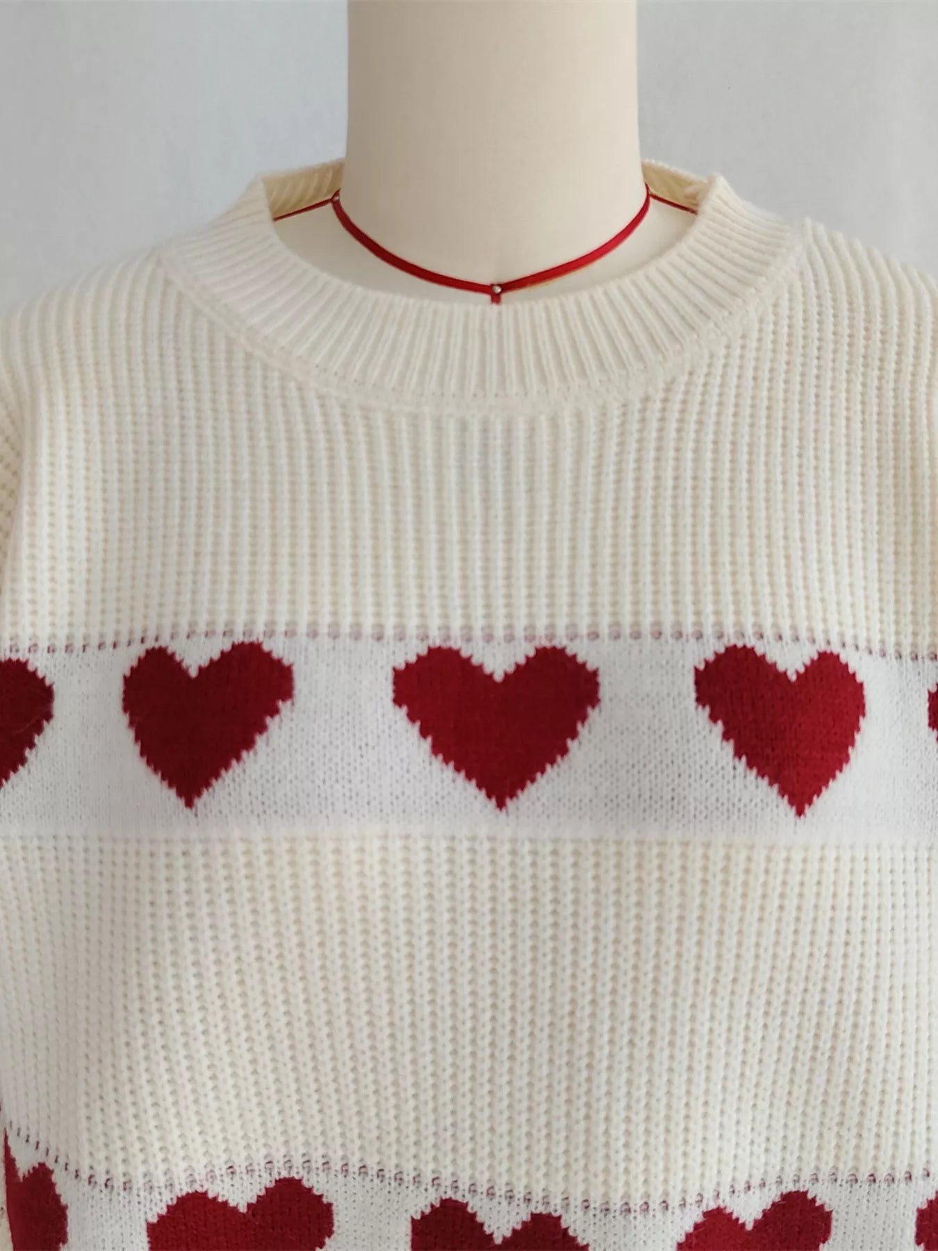 Heart Pattern Dropped Shoulder Sweater designed for comfort and style at Lookzlike