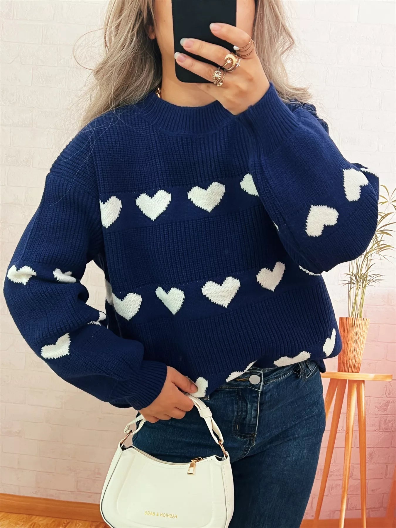 Heart Pattern Dropped Shoulder Sweater designed for comfort and style at Lookzlike