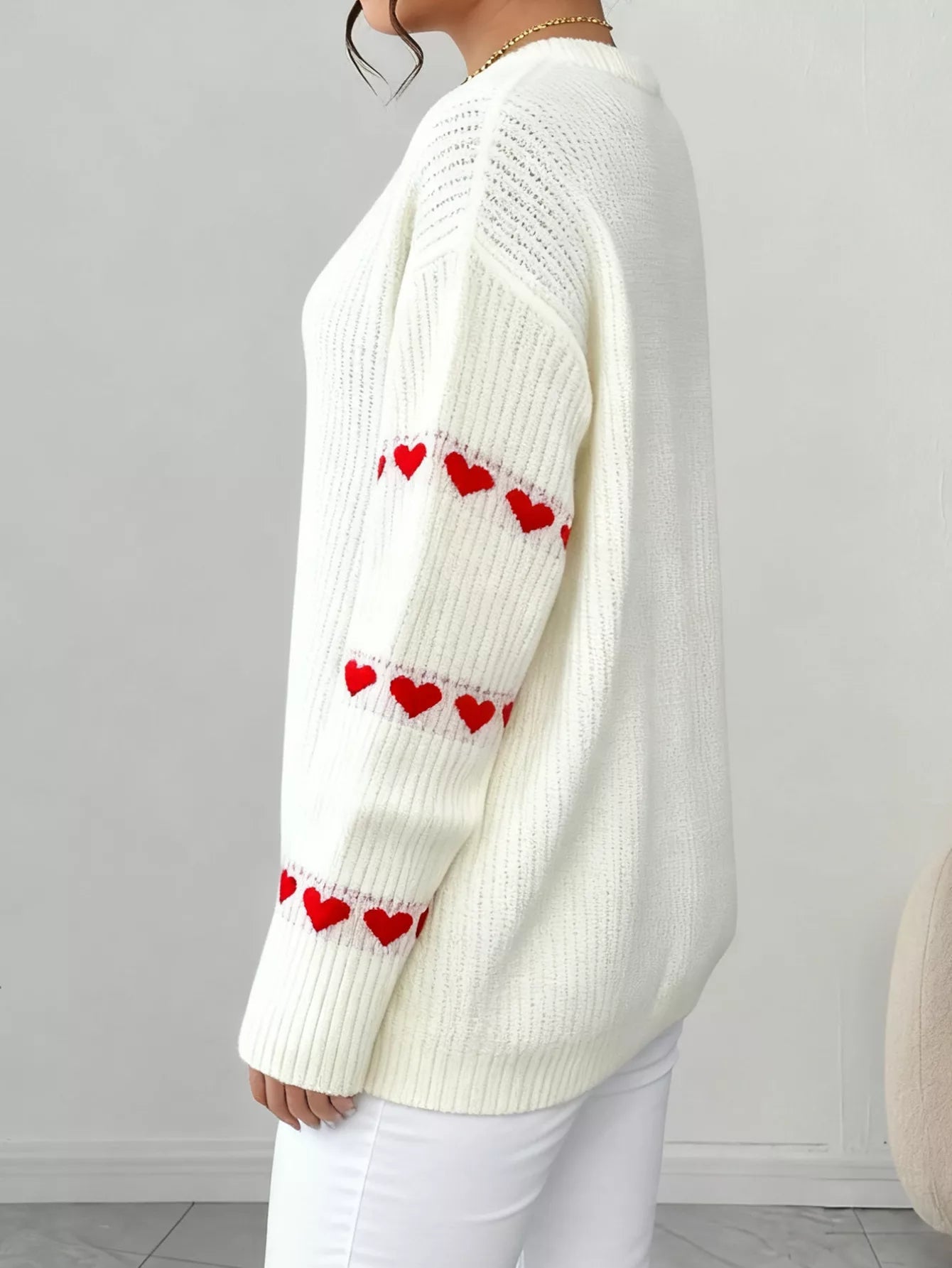 Heart Pattern Round Neck Sweater designed for comfort and style at Lookzlike