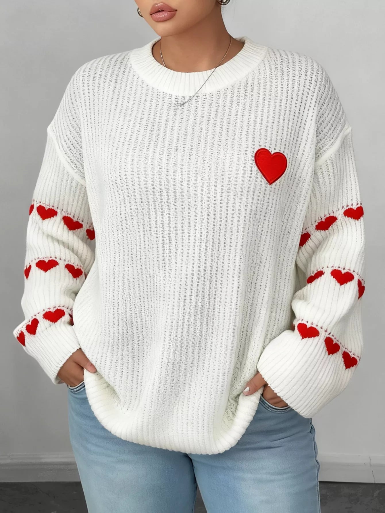 Heart Pattern Round Neck Sweater designed for comfort and style at Lookzlike