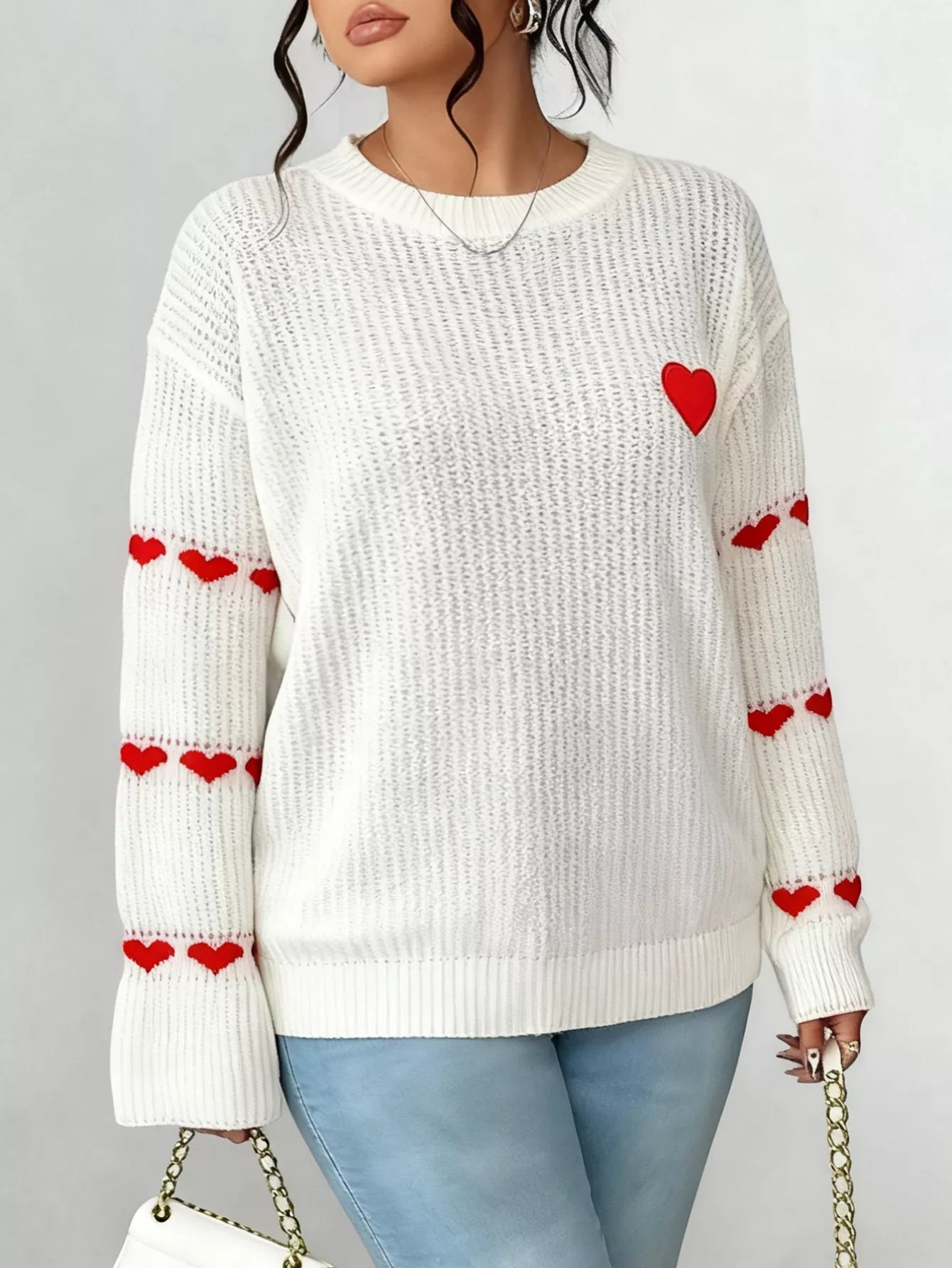 Heart Pattern Round Neck Sweater designed for comfort and style at Lookzlike