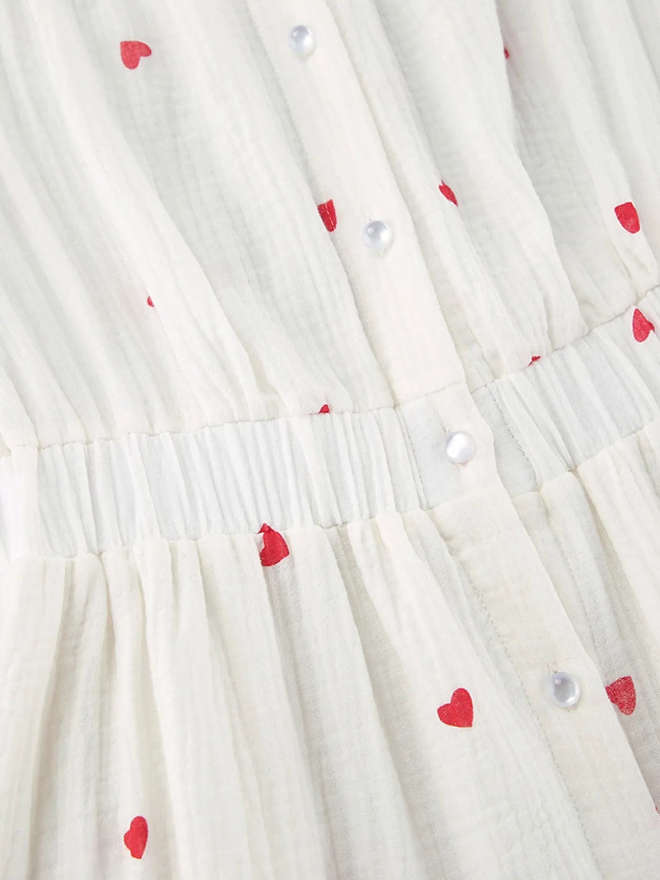 Heart Printed Off-Shoulder Ruffle Mini Dress designed for comfort and style at Lookzlike