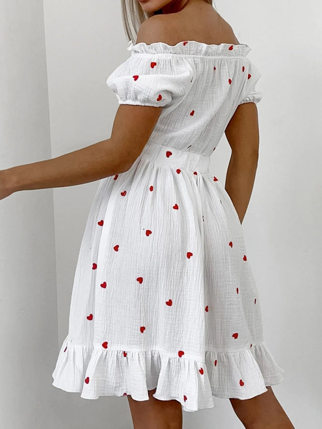 Heart Printed Off-Shoulder Ruffle Mini Dress designed for comfort and style at Lookzlike