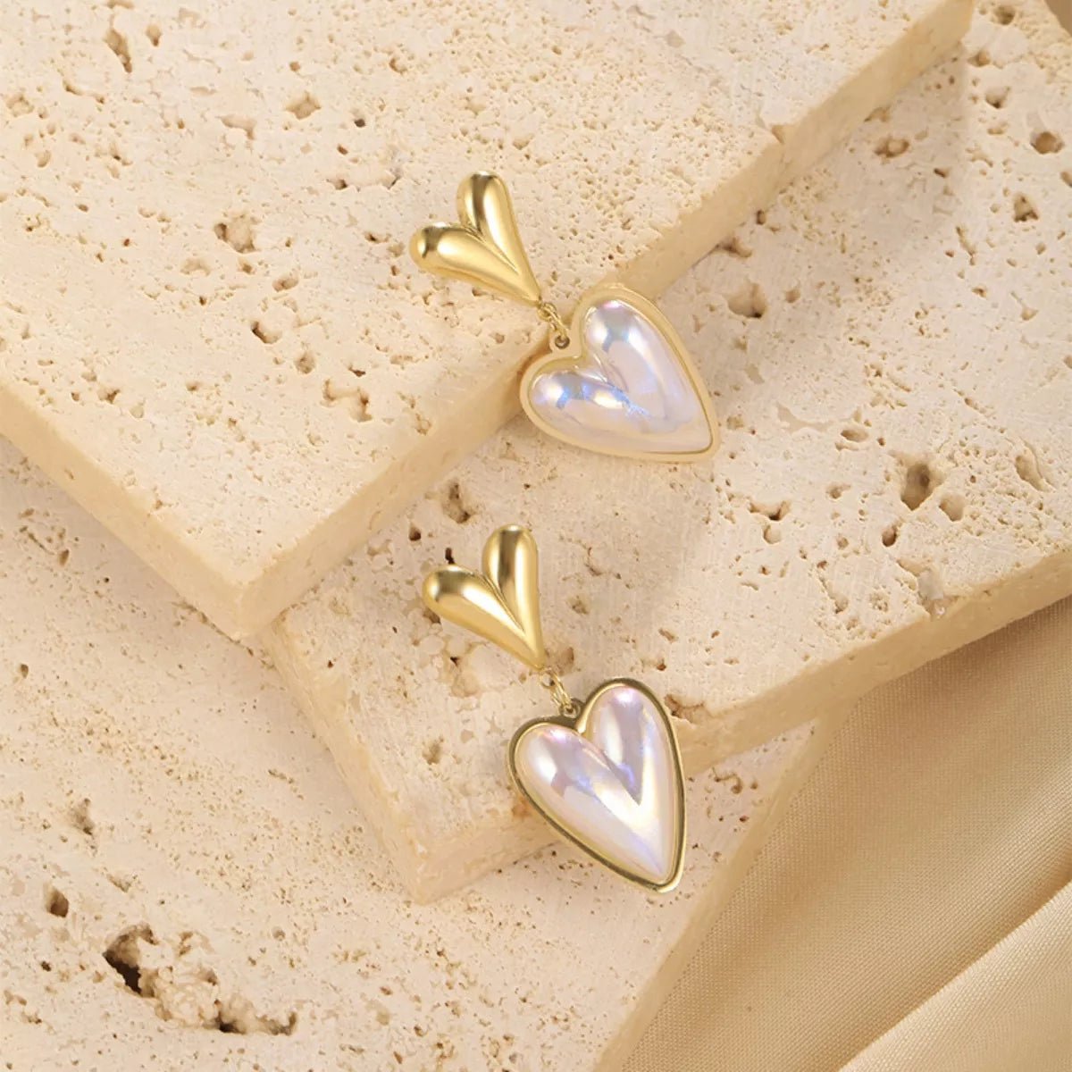 Heart - Shaped Pearl Drop Earrings designed for comfort and style at Lookzlike