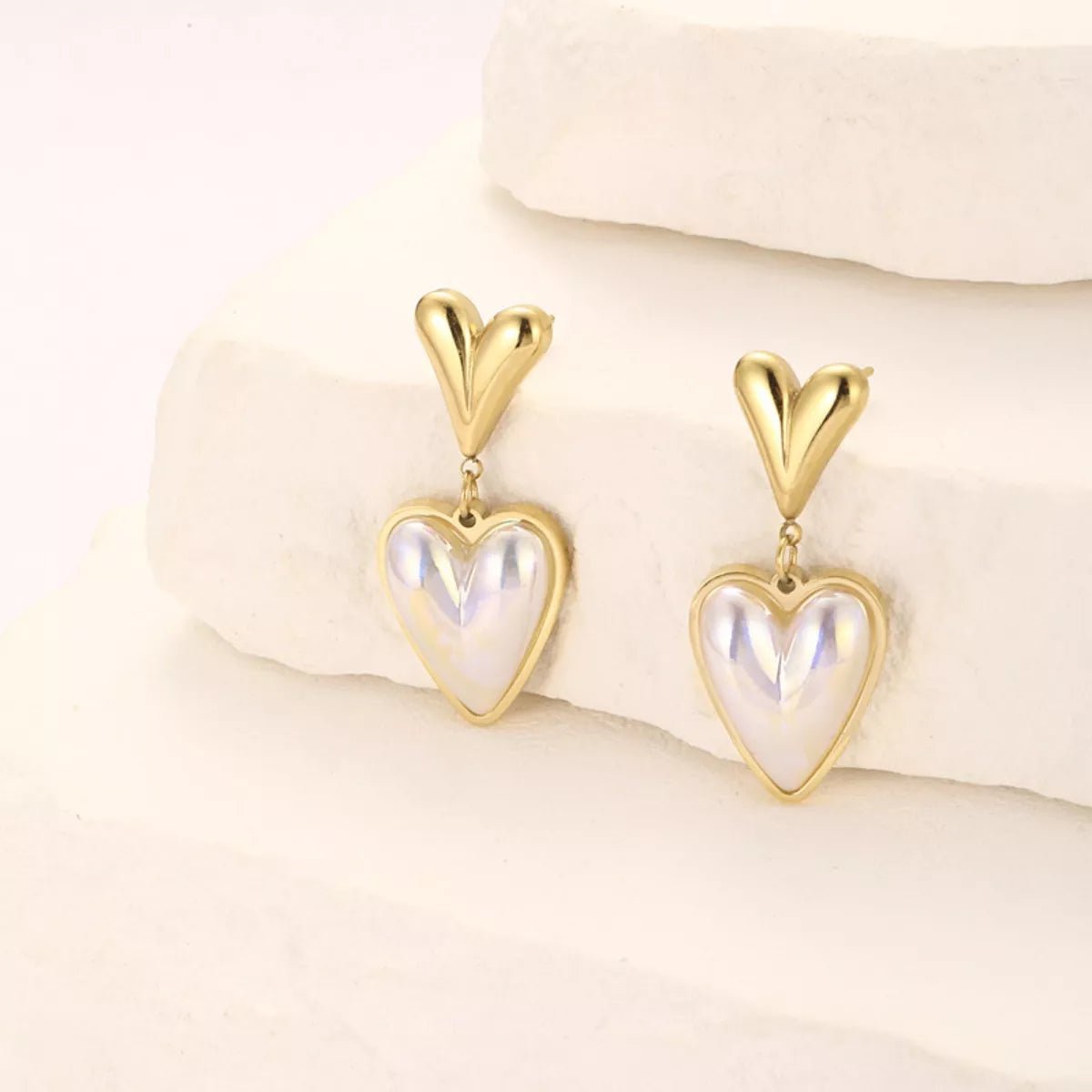 Heart - Shaped Pearl Drop Earrings designed for comfort and style at Lookzlike