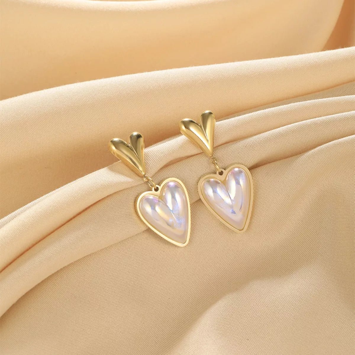 Heart - Shaped Pearl Drop Earrings designed for comfort and style at Lookzlike