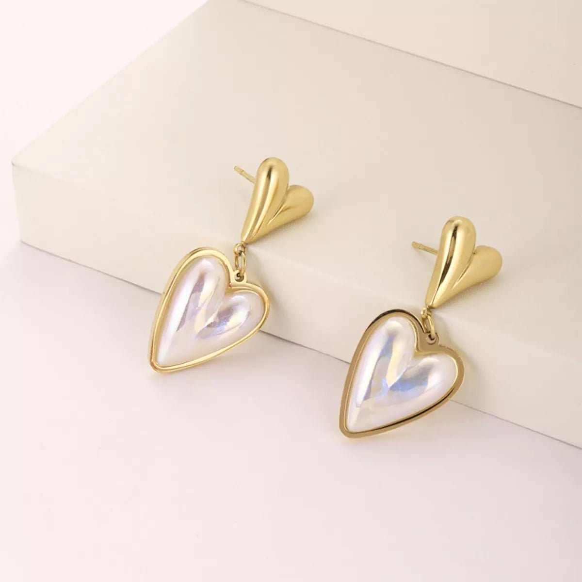 Heart - Shaped Pearl Drop Earrings designed for comfort and style at Lookzlike