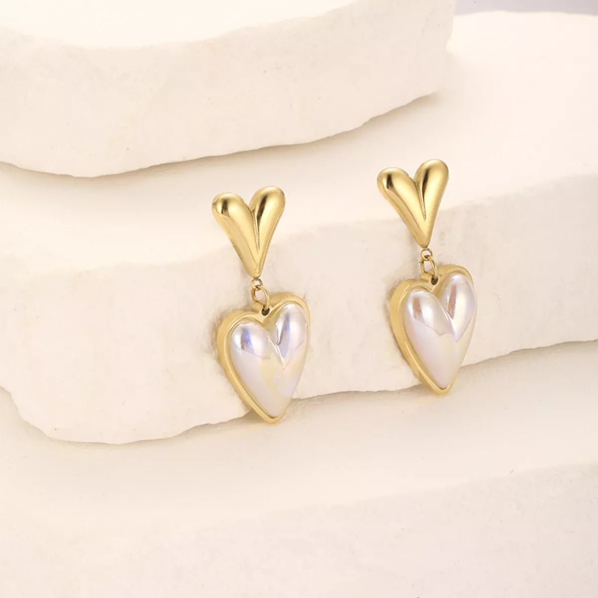 Heart - Shaped Pearl Drop Earrings designed for comfort and style at Lookzlike