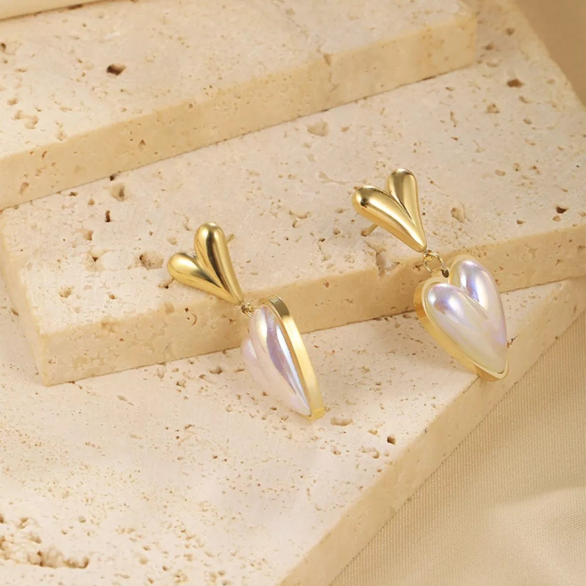 Heart - Shaped Pearl Drop Earrings designed for comfort and style at Lookzlike