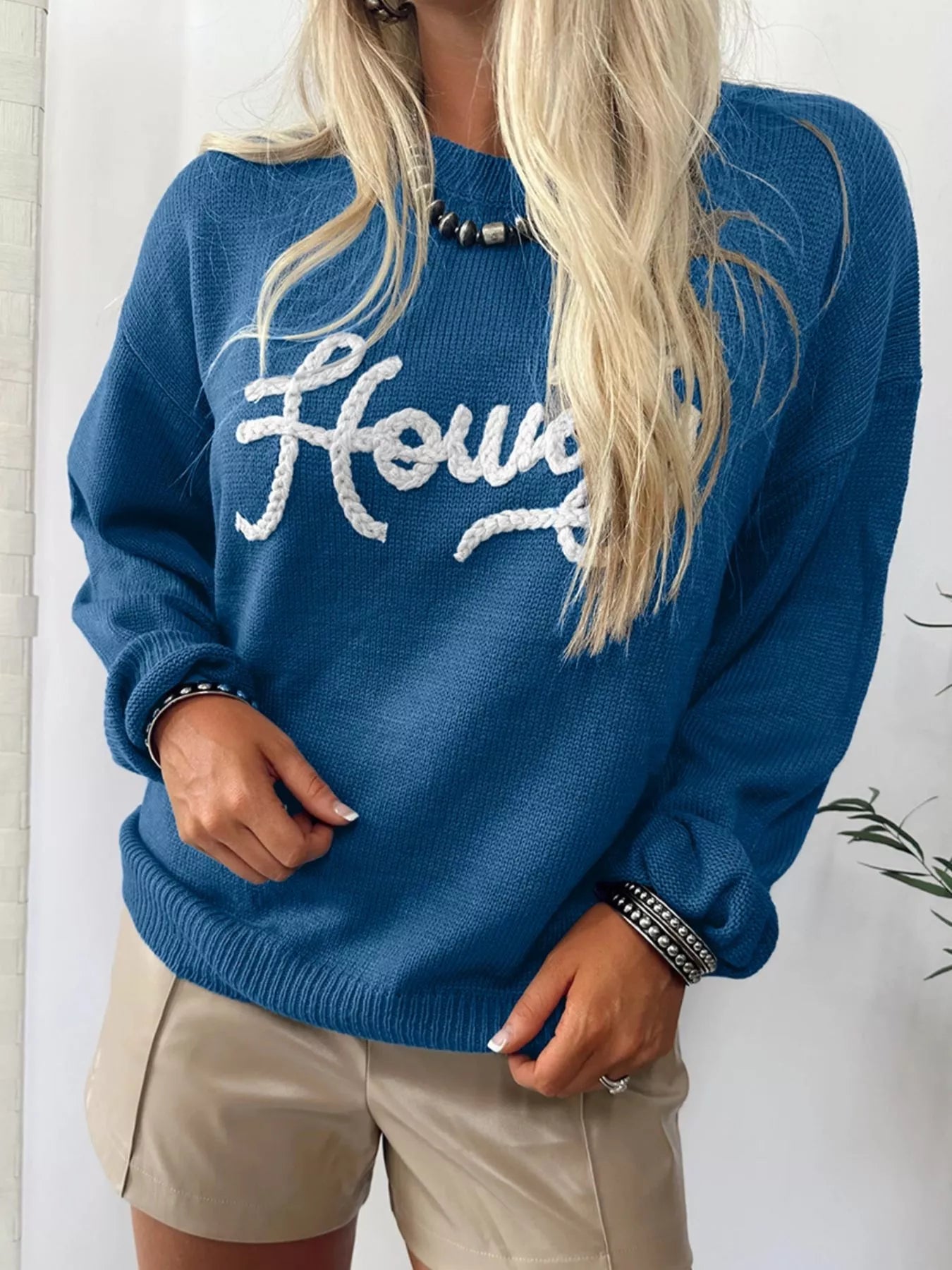 Howdy Embroidered Round Neck Sweater designed for comfort and style at Lookzlike