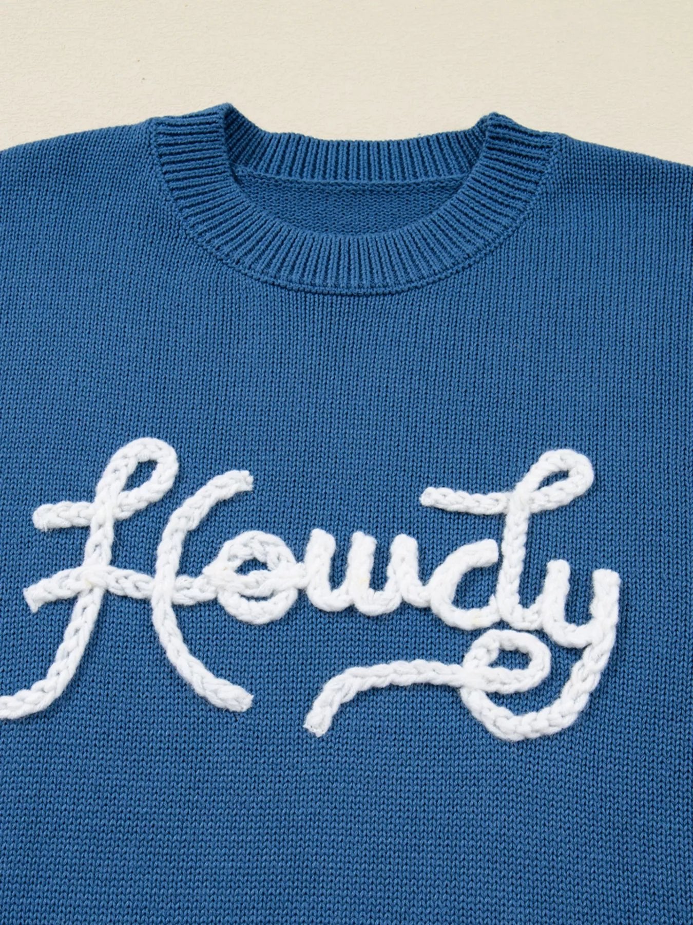 Howdy Embroidered Round Neck Sweater designed for comfort and style at Lookzlike