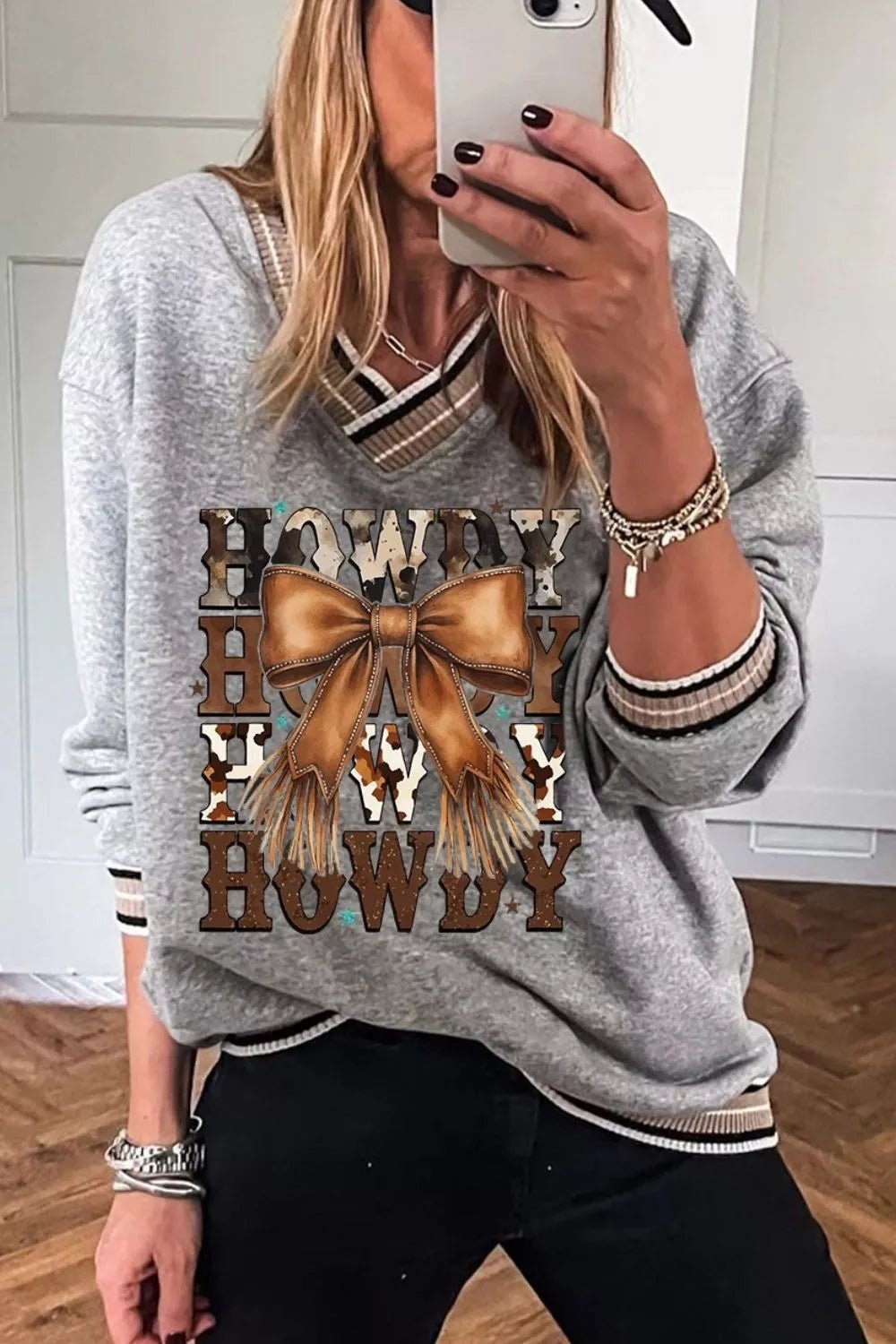 Howdy Graphic V - Neck Sweatshirt designed for comfort and style at Lookzlike