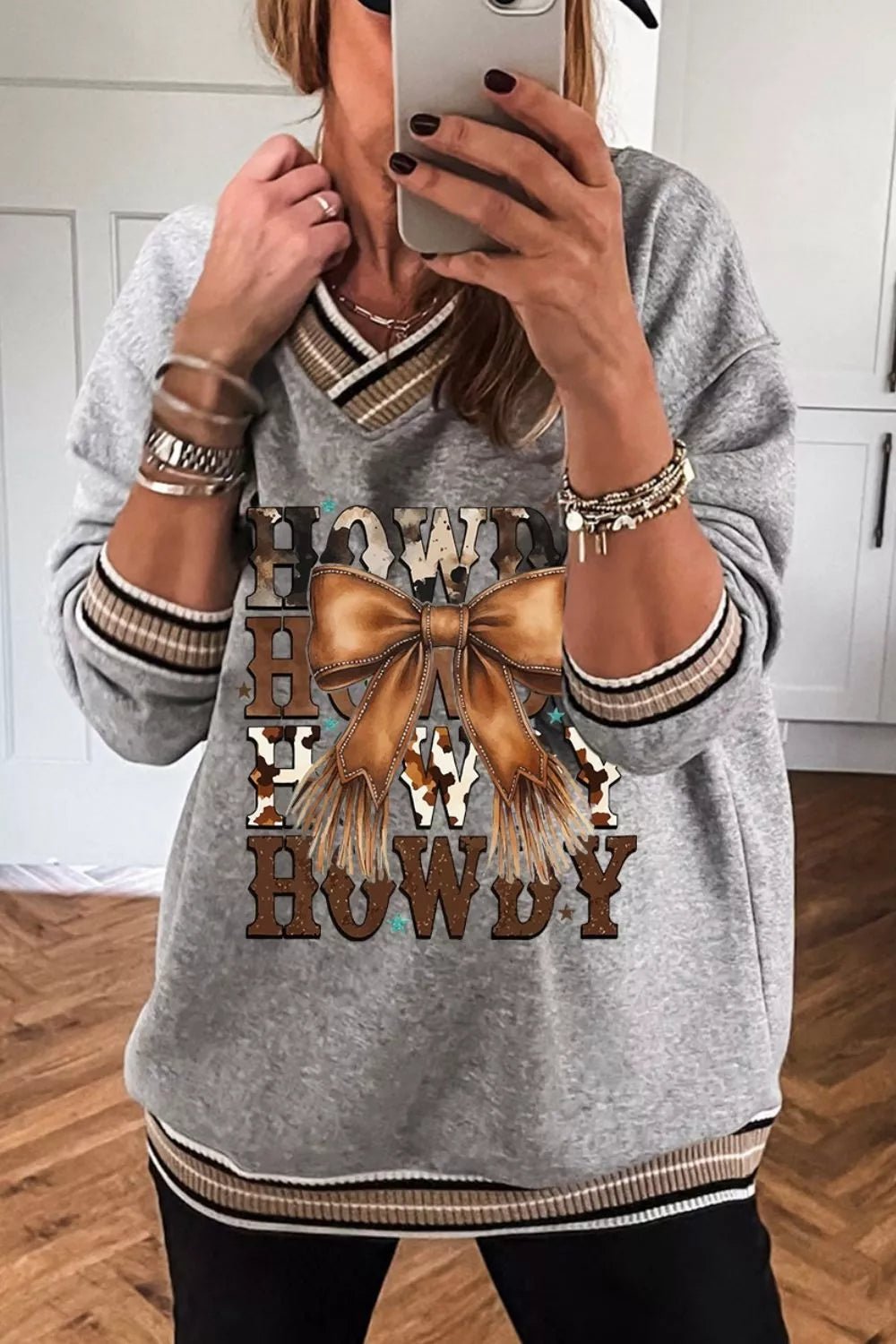 Howdy Graphic V - Neck Sweatshirt designed for comfort and style at Lookzlike