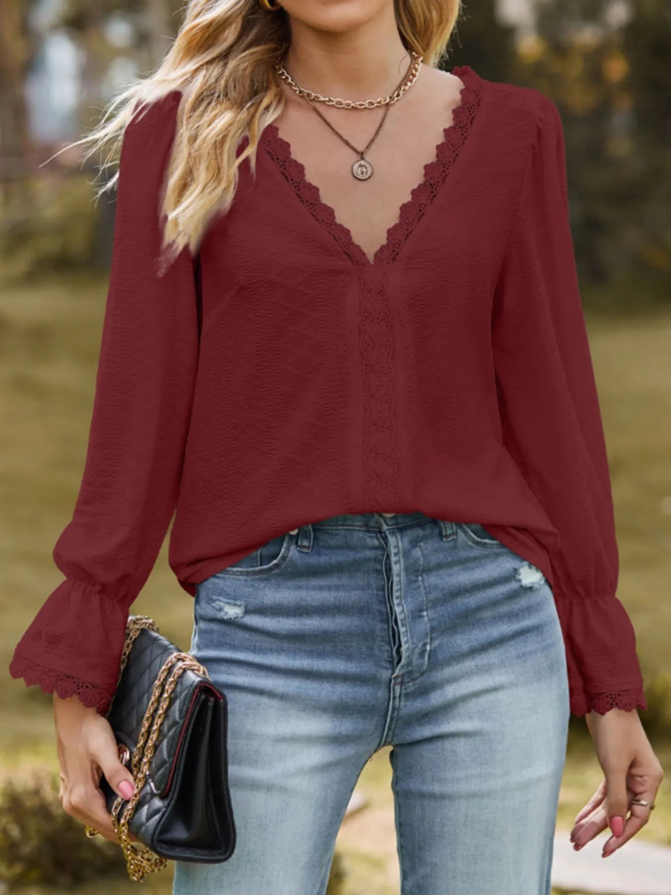 Lace Trim V - Neck Blouse with Flounce Sleeves designed for comfort and style at Lookzlike