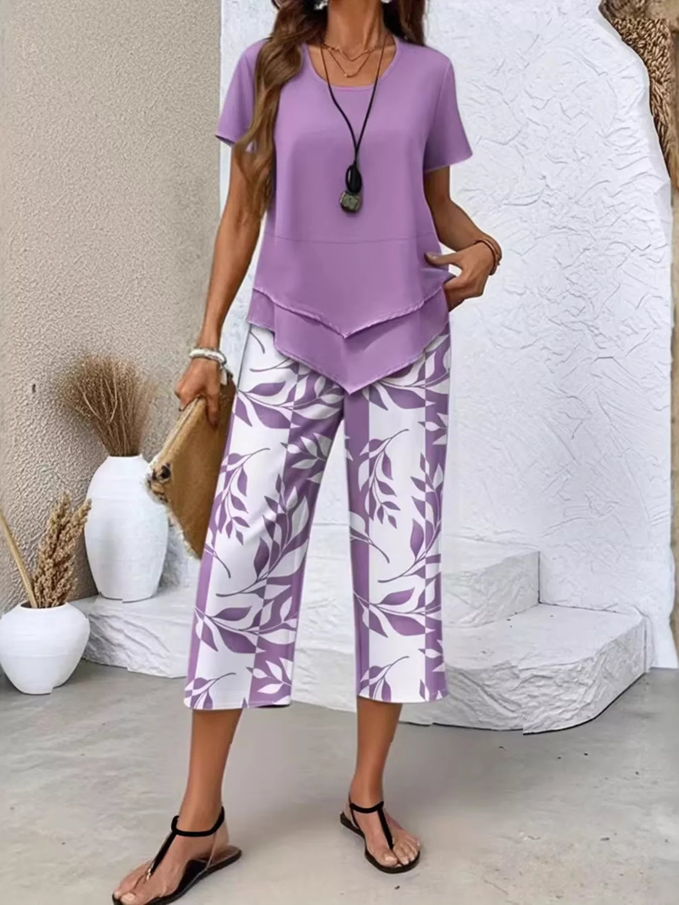 Layered Top and Leaf Print Cropped Pants Set designed for comfort and style at Lookzlike