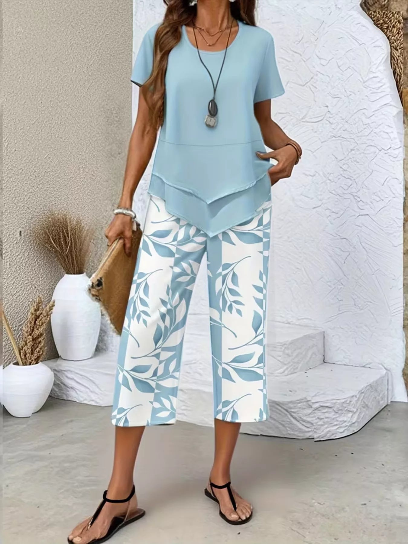 Layered Top and Leaf Print Cropped Pants Set designed for comfort and style at Lookzlike