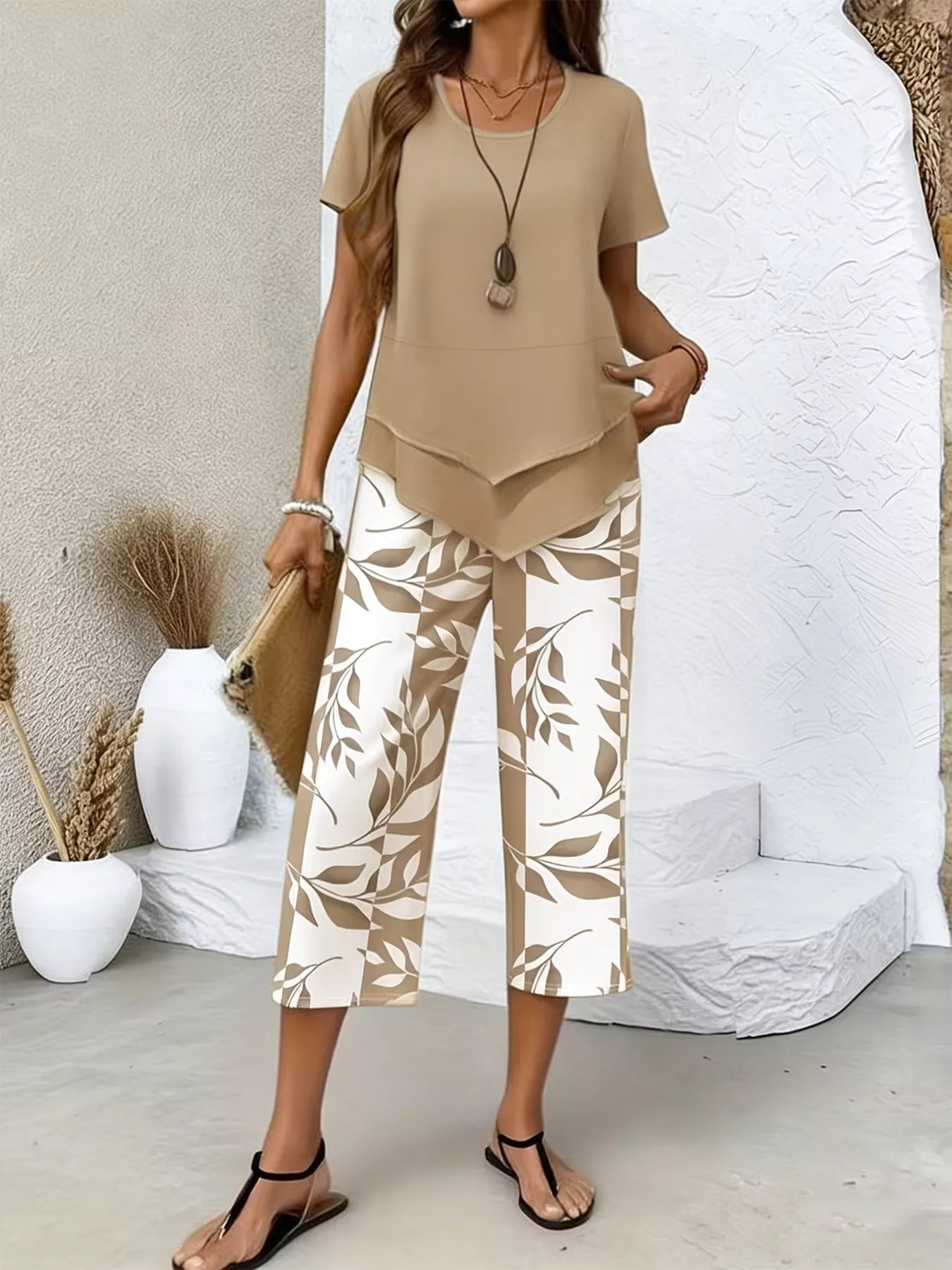 Layered Top and Leaf Print Cropped Pants Set designed for comfort and style at Lookzlike
