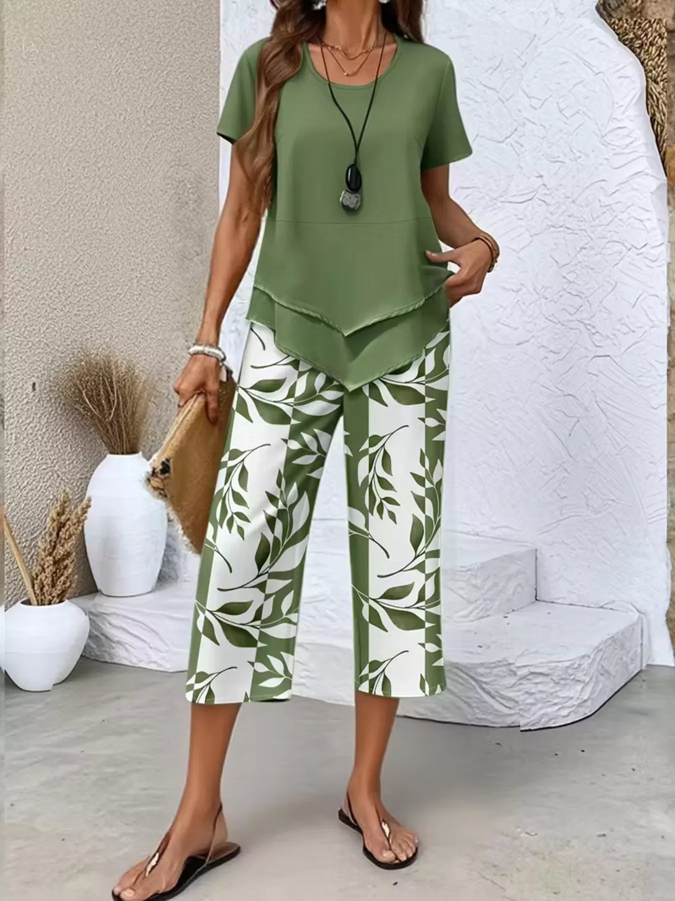 Layered Top and Leaf Print Cropped Pants Set designed for comfort and style at Lookzlike