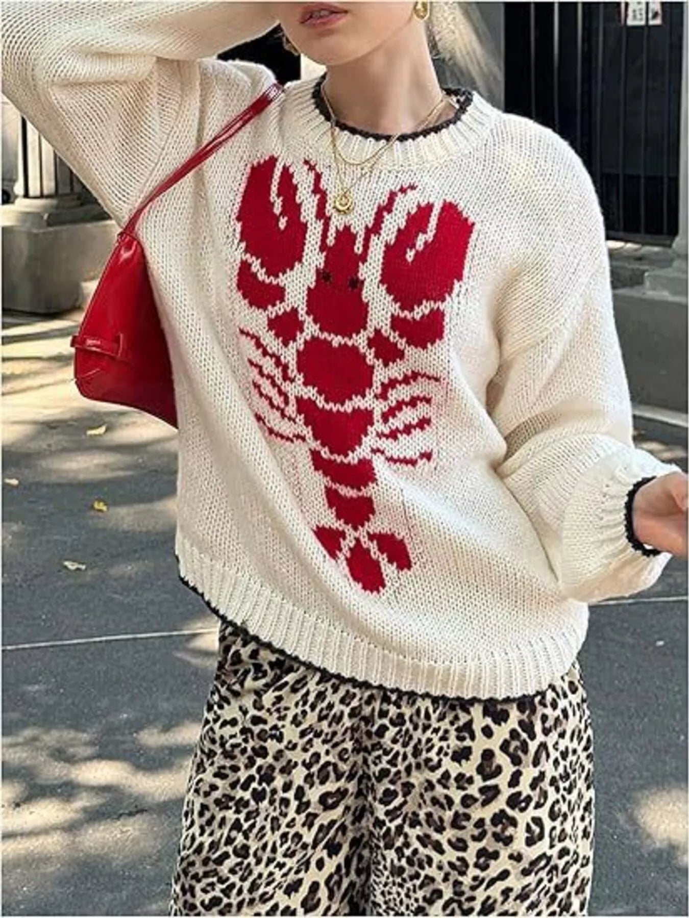 Lobster Round Neck Dropped Shoulder Sweater designed for comfort and style at Lookzlike