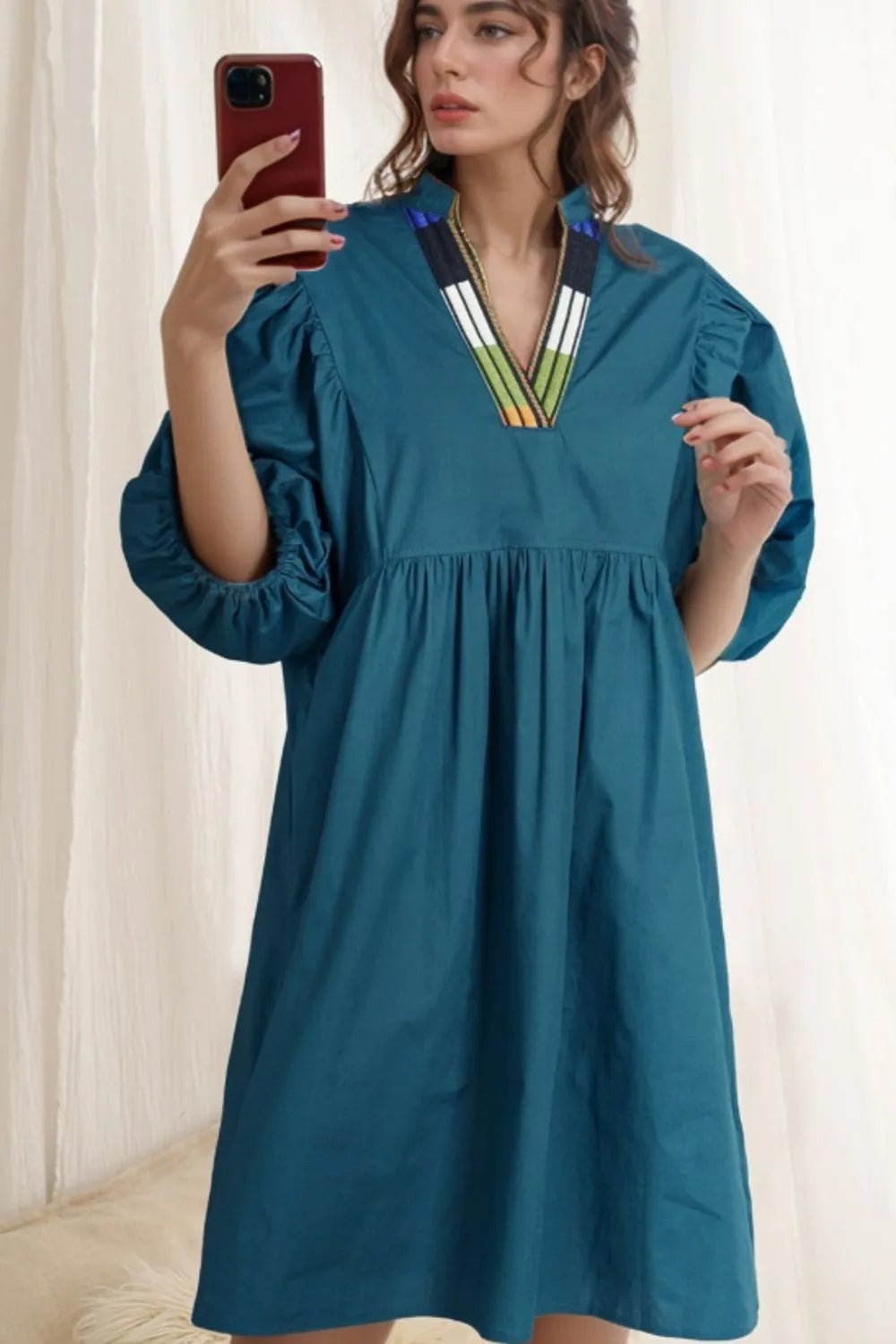 Loose Fit Puff Sleeve Mini Dress designed for comfort and style at Lookzlike