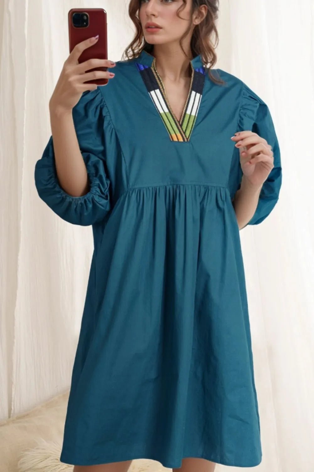 Loose Fit Puff Sleeve Mini Dress designed for comfort and style at Lookzlike