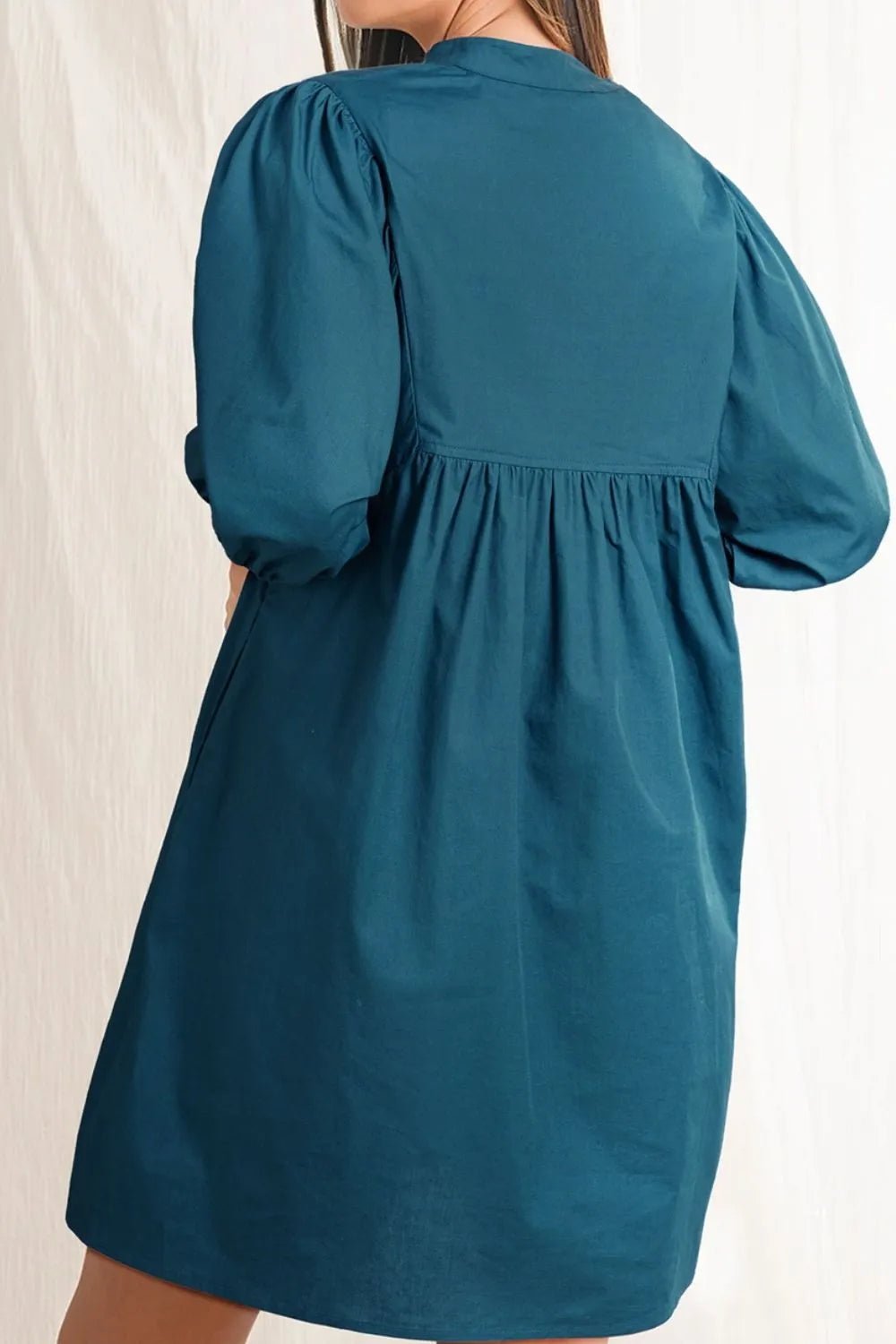 Loose Fit Puff Sleeve Mini Dress designed for comfort and style at Lookzlike