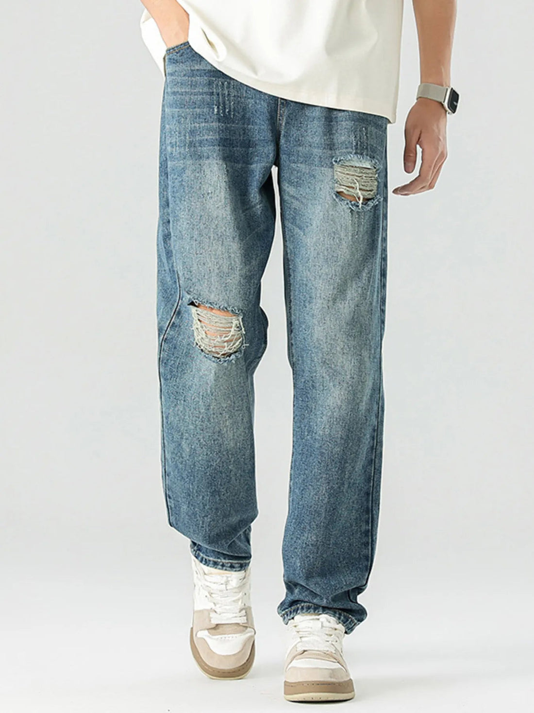 Men's Distressed Relaxed Fit Jeans designed for comfort and style at Lookzlike
