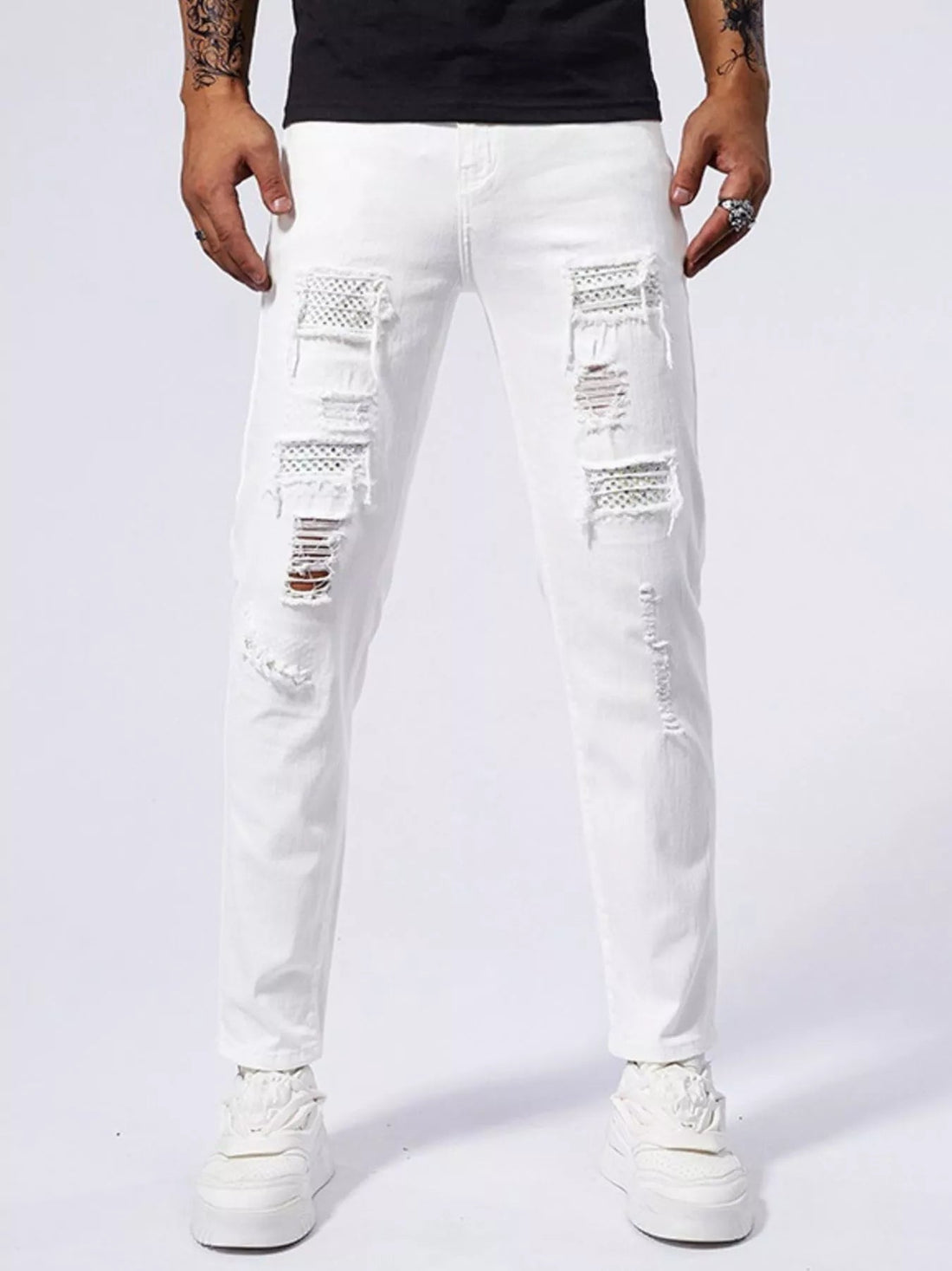 Men's Distressed Slim Fit Jeans designed for comfort and style at Lookzlike