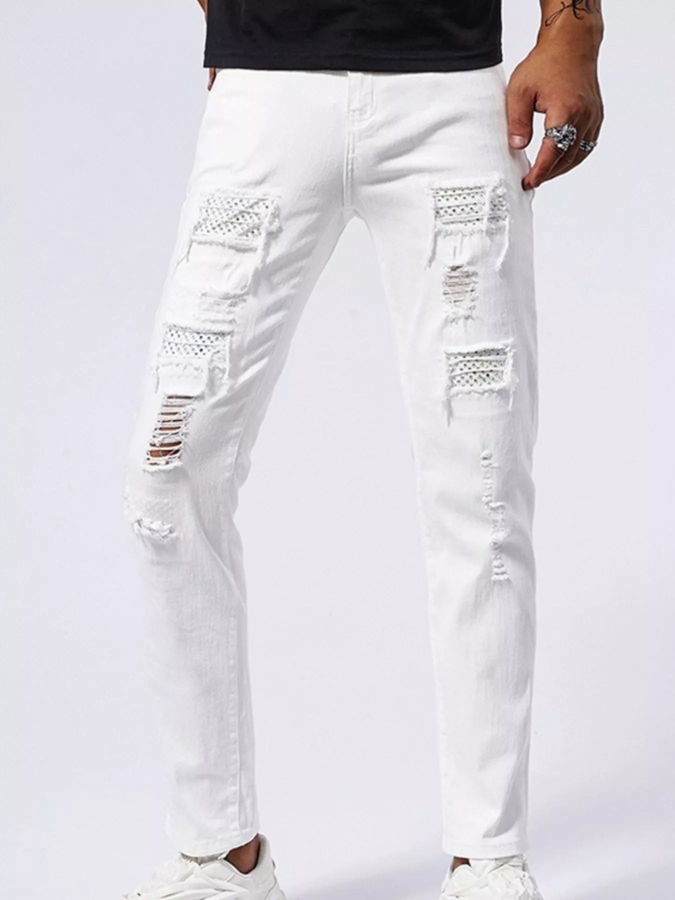 Men's Distressed Slim Fit Jeans designed for comfort and style at Lookzlike