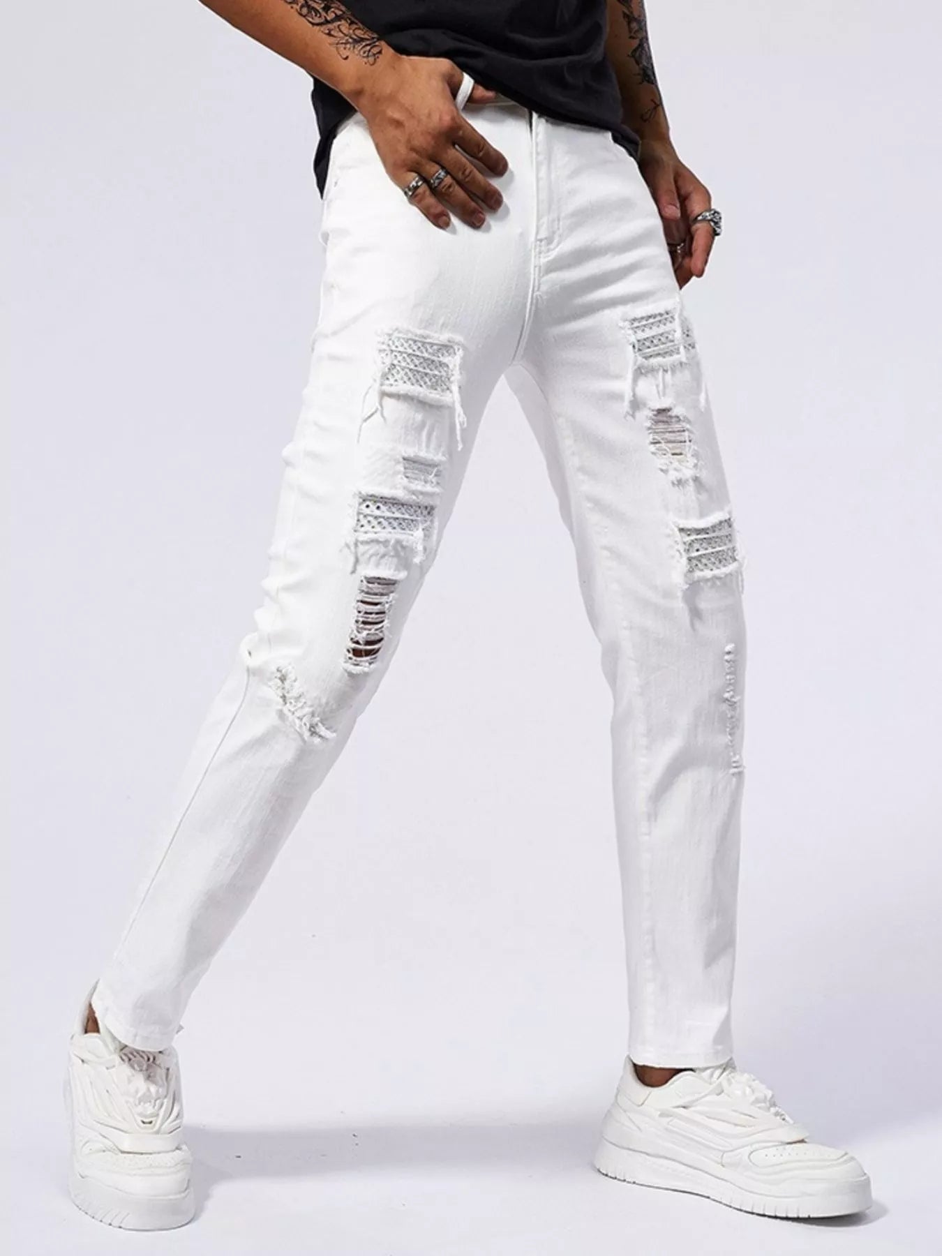 Men's Distressed Slim Fit Jeans designed for comfort and style at Lookzlike